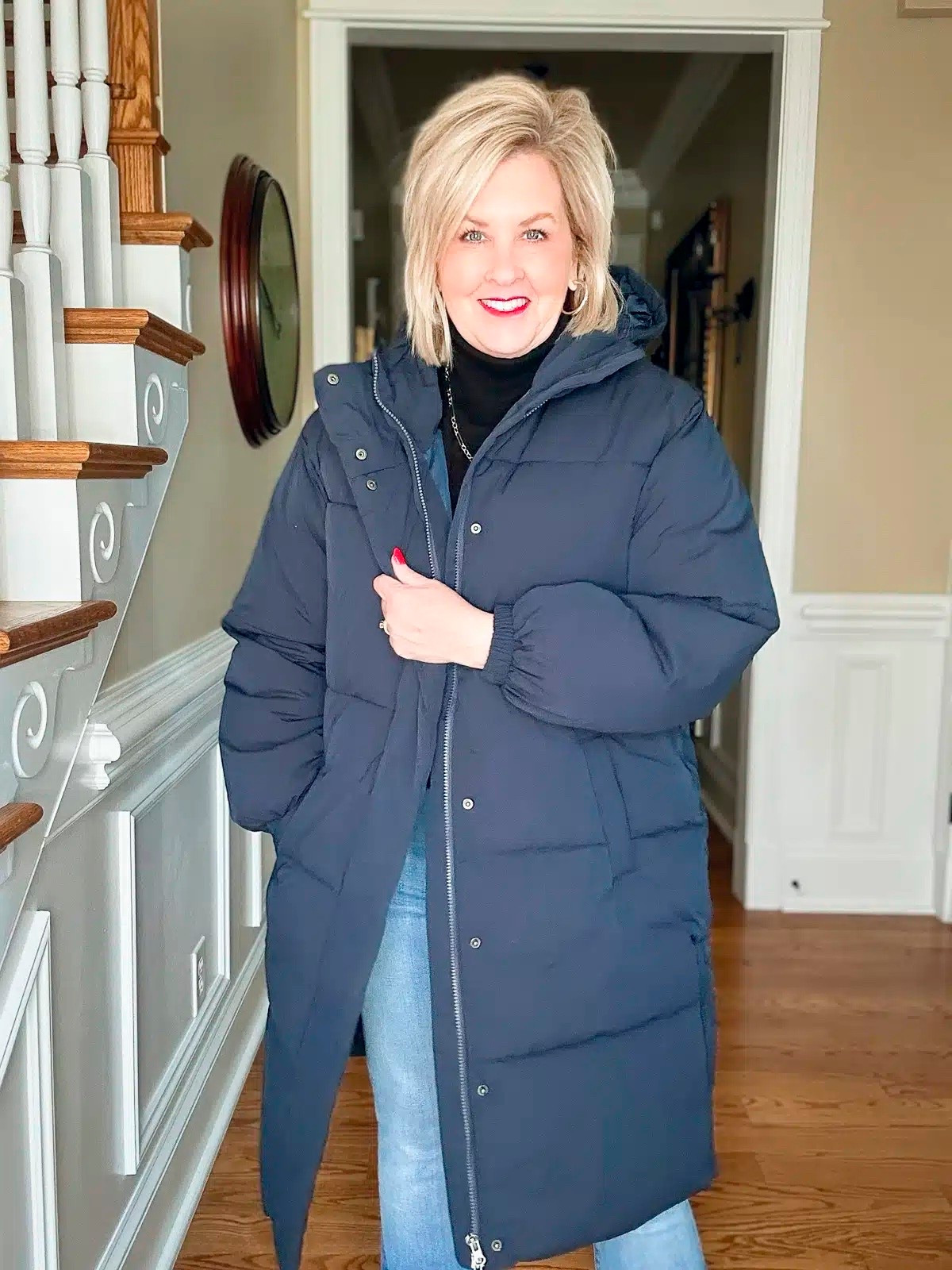 This navy puffer coat is a heavyweight for Winter and comes in multiple colors. I also love that it has a hood for rain or snow. I’m wearing a medium and my turtleneck is a large. 

#LTKSeasonal #LTKTravel #LTKootd
