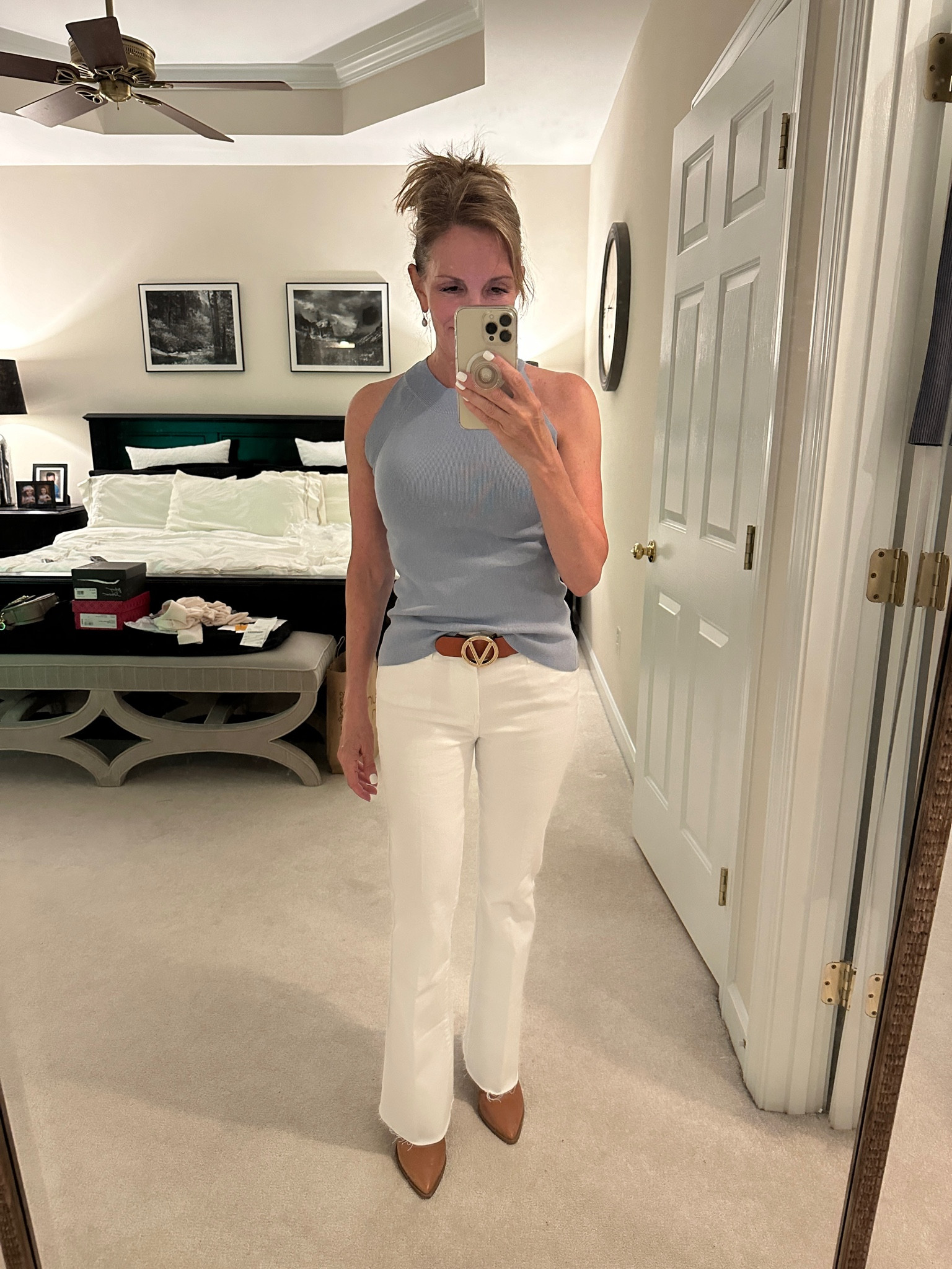 Chic, white denim with a soft sleeveless top and fashionable belt

#LTKSaleAlert #LTKStyleTip #LTKOver40