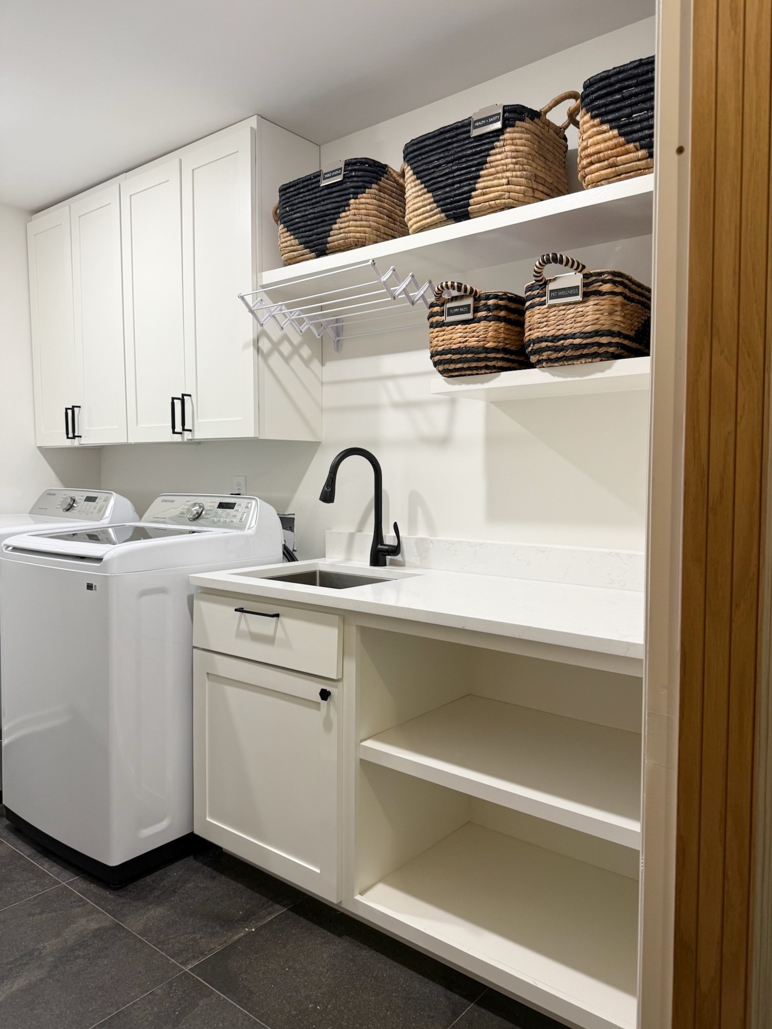 We get it - the laundry room is one of those "in and out" spaces that never seems to stay organized. Between kids' uniforms, mismatched socks, and detergent clutter, it can start to feel like laundry is running you. That's why we design laundry rooms that actually work for your real life - with smart zones for sorting, folding, and storage that make the process feel easy. Because when the laundry room flows, your week runs smoother. 👏👏👏

🧺 Ready for calm in this space? A Jumpstart Session can have your laundry area totally refreshed in just one day. DM us today!

#LTKKids #LTKHome #LTKFamily