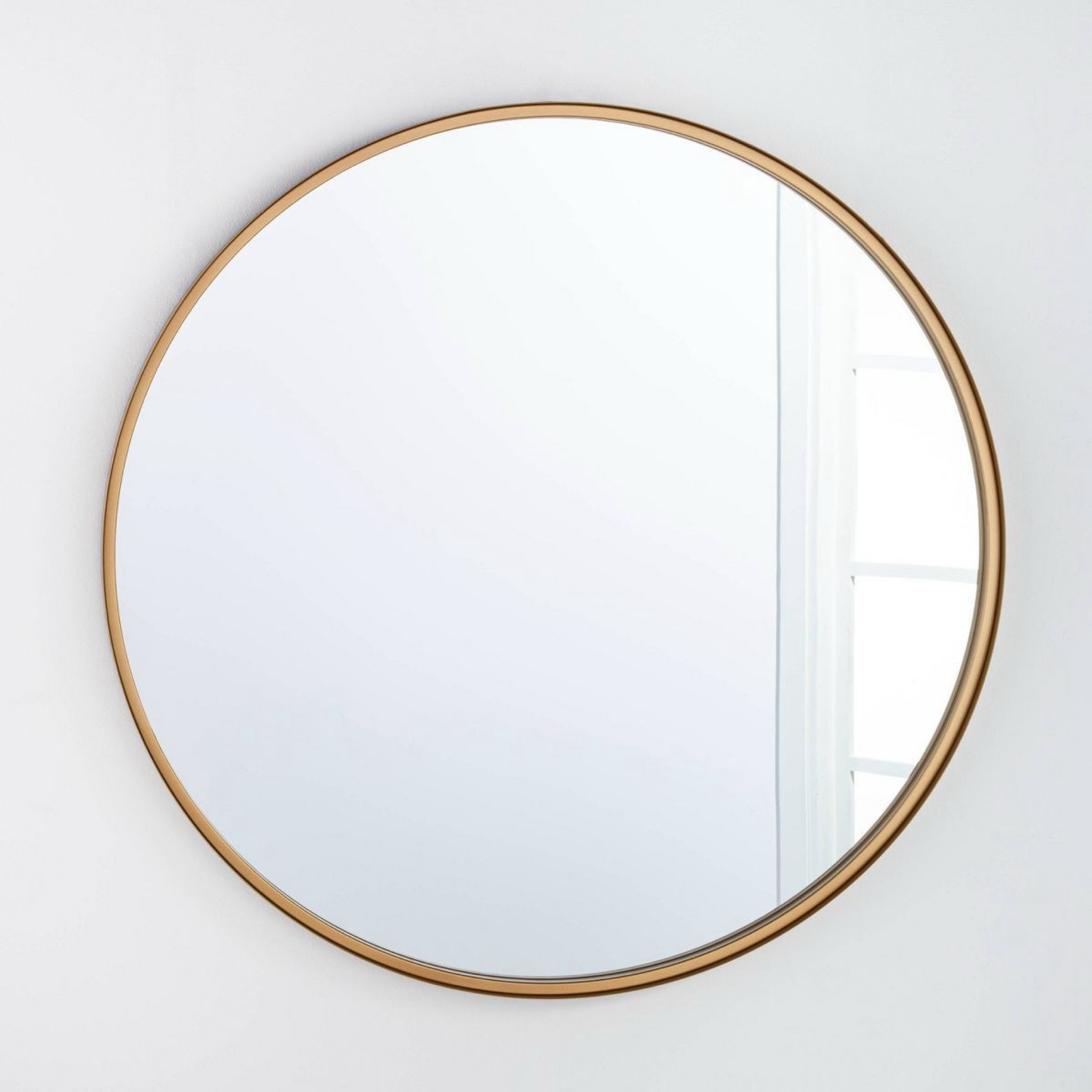 Large round mirror in my boys bathroom.
34” diameter 
Comes in brass or black 

#LTKhome #LTKstyletip #LTKfindsunder100