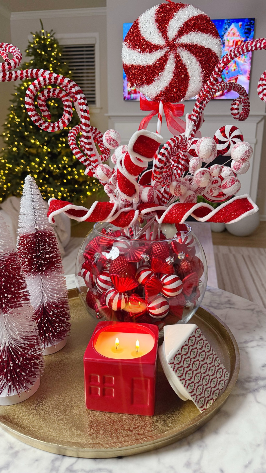 Fun and festive Christmas Candy Cane Centerpiece

#christmas #christmasdecor #candycanedecor #christmasdiy #diydecoration #Itkseasonal #ltkhome

#LTKSeasonal #LTKHoliday #LTKHome