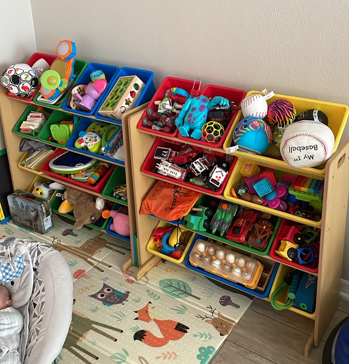 These toy bins are a game changer. I bought 2 to put side-by-side but they hold soooo many toys. Comes in a few color options. Amazon find. Also comes with a loop so you can nail them to the wall to avoid it falling on your kiddos if they pull on it. Highly recommend! 

#LTKkids #LTKhome #LTKfamily