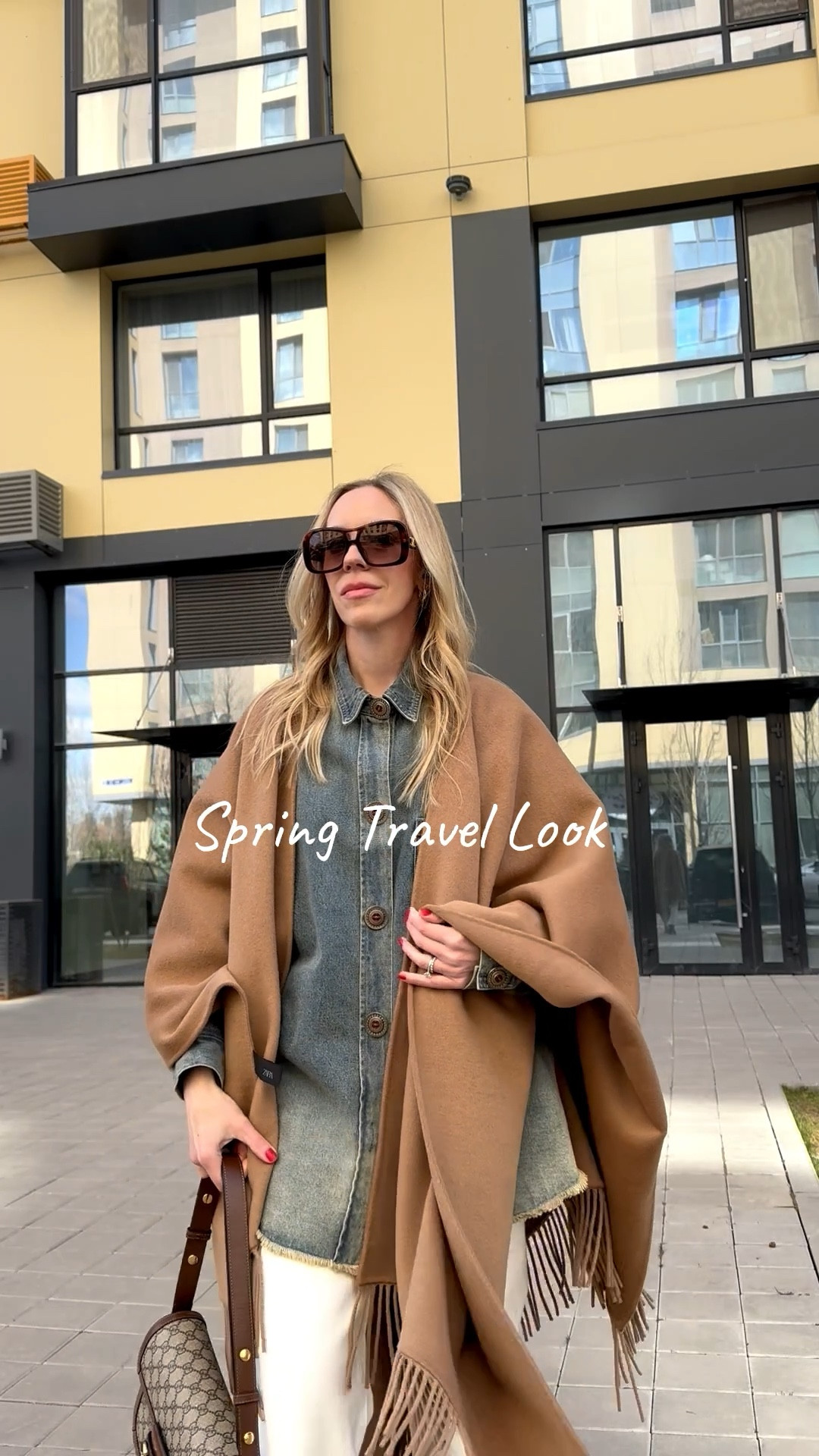 Spring travel outfit, camel cape, denim on denim, denim shirt, @levi white baggy 90’s jeans, western boots

#LTKOver40 #LTKTravel #LTKSeasonal