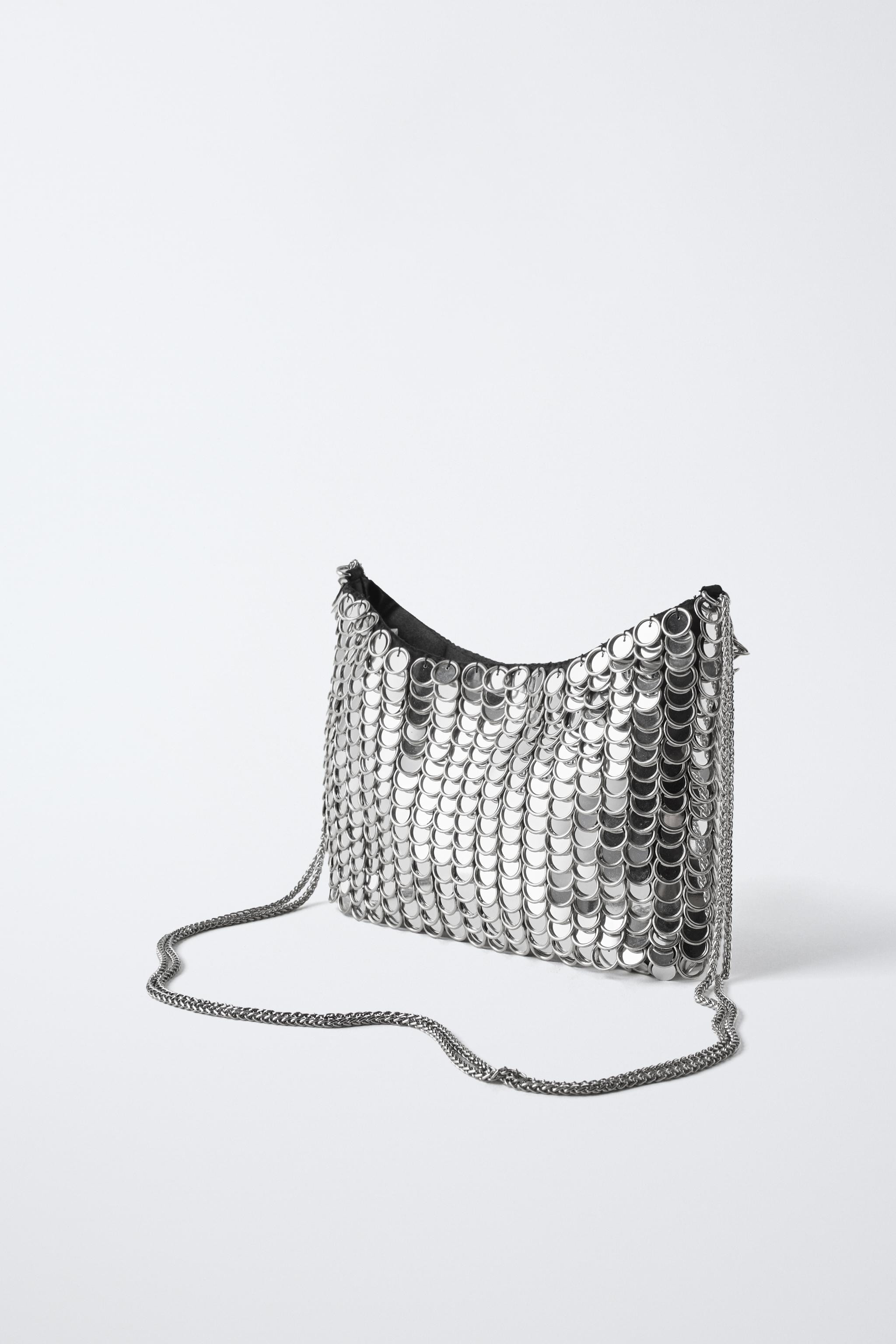 METALLIC BAG$ 55.90Silver | 1174/530/092Add to cartAddCrossbody bag with metallic details. Main c... | Zara US