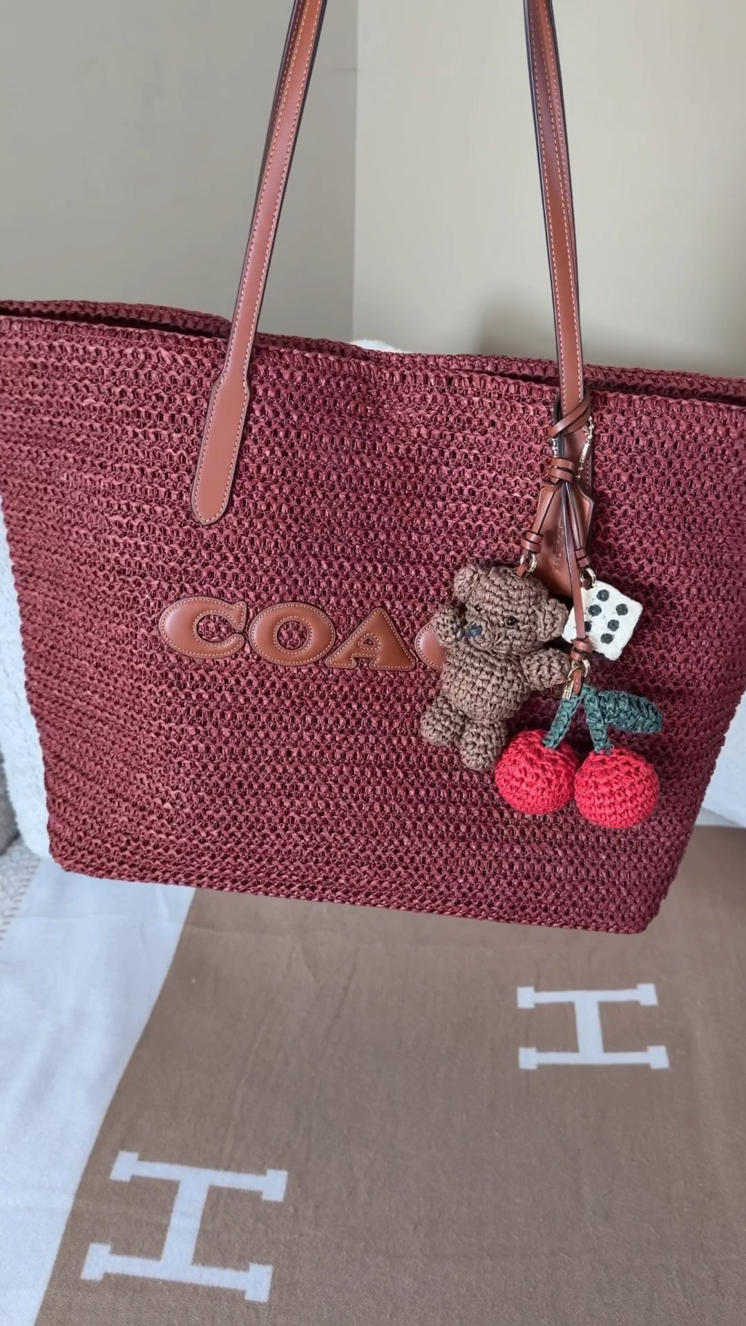 This latest Coach Outlet 5/27 drop is the best one yet so this is just one of the bags I got (and I made sure it’s still available online) ♥️so comment SHOP & I’ll dm you the link 🍒

The straw Coach city totes were a huge standout for me. I love the OG city tote in leather so I knew I needed a straw one for the pool ⛱️

I was so torn between the striped one, gingham and the burgundy one with all of the crochet straw bag charms. Obviously the cute teddy bear, cherry, and dice charms won out for me.

I love the combination of the burgundy straw and the brown leather Coach logo and leather straps. Gives me such luxurious summer resort vibes

This straw tote is super flexible and I think the straw texture will soften over time. I added a felt insert to add some structure to it and make it stand up by its self and hold its shape.

#LTKTravel #LTKSwim

Comment SHOP below to receive a DM with the link to this post on my LTK ⬇ https://liketk.it/6enj7