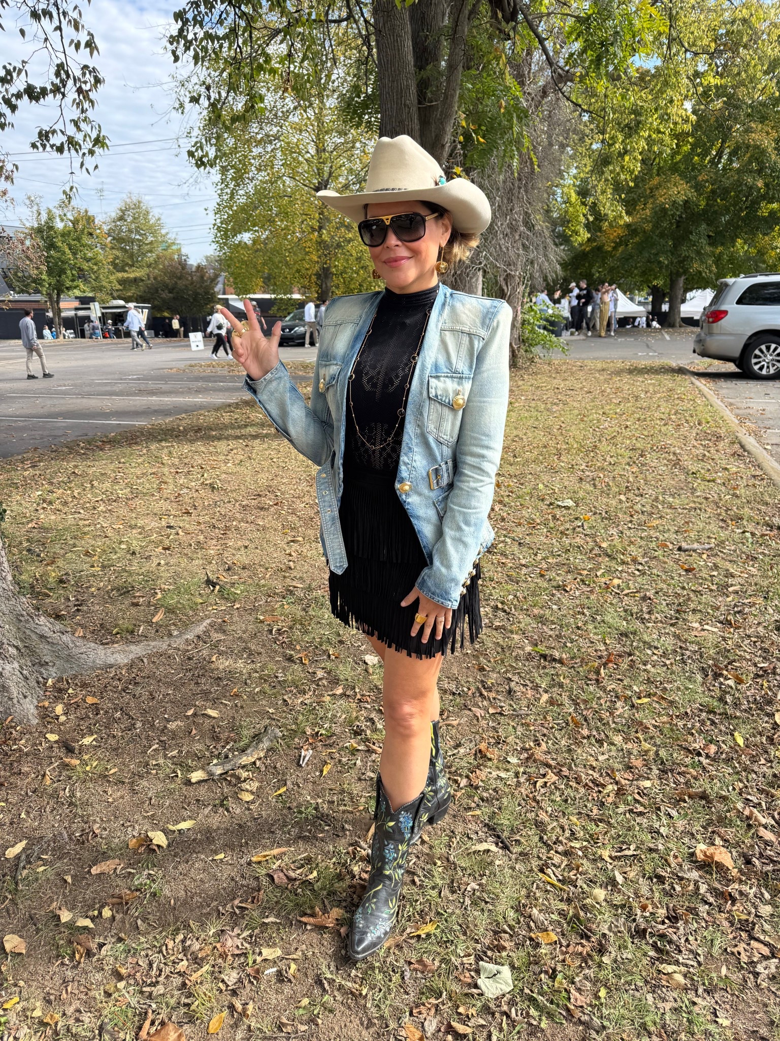 Game day look. Love a sheer top with a jacket! 