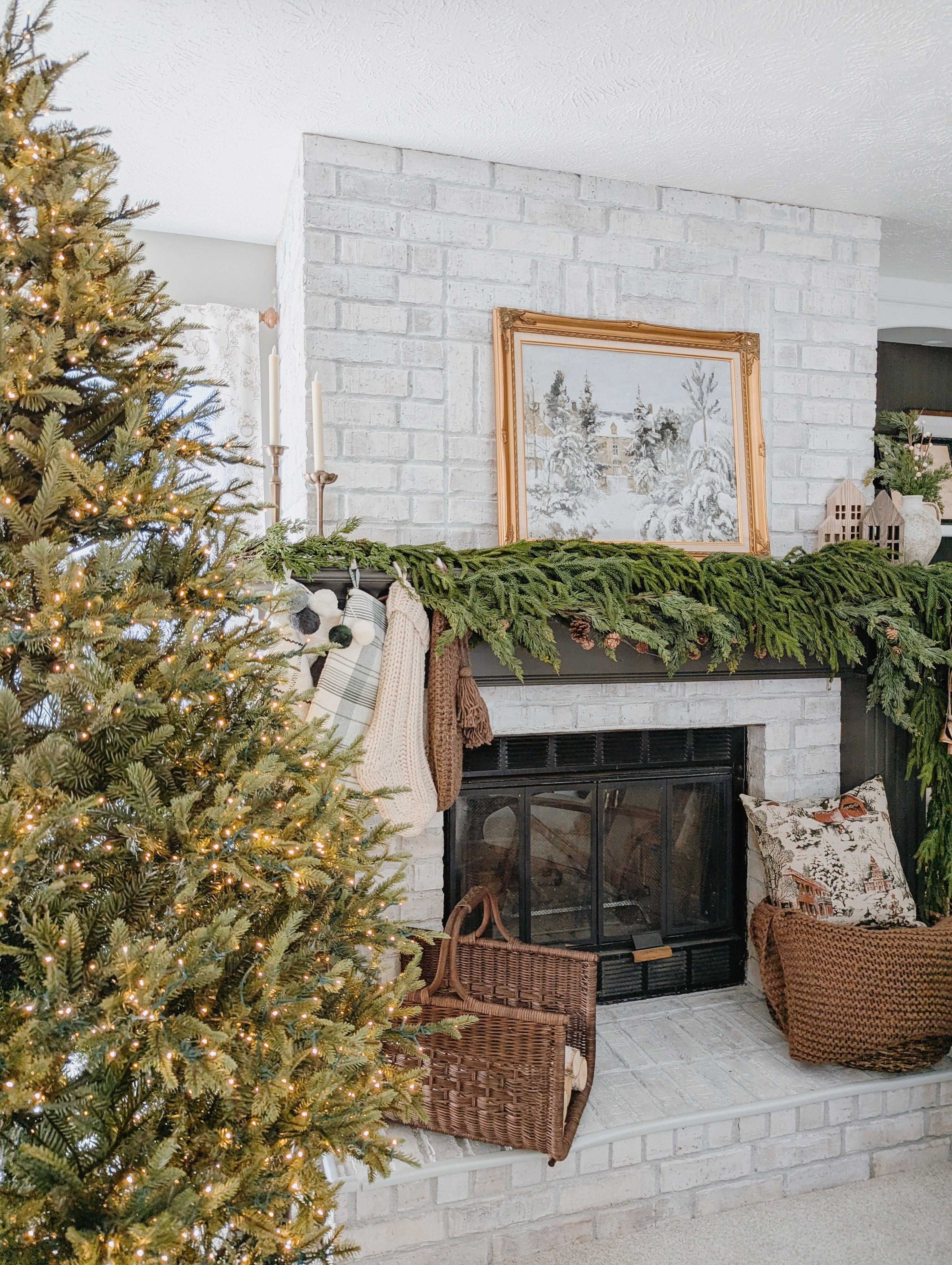 My cozy Christmas fireplace mantle setup! The garland setup includes 4 total. 2 of the Kirkland Norfolk Pine ones, and 2 Magnolia real touch with pinecones. The rest of the accents are mostly Target decorations! #christmashome #christmasmantle #christmasfireplace #christmasgarland #mantledecor #targethome #targetchristmas 

#LTKHoliday #LTKHome #LTKSeasonal