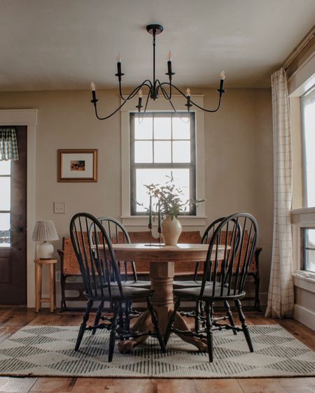 Moody dining room inspiration with chandelier black chairs magnolia home hearth and hand Target vintage eclectic style home style

#LTKhome #LTKFind #LTKunder100