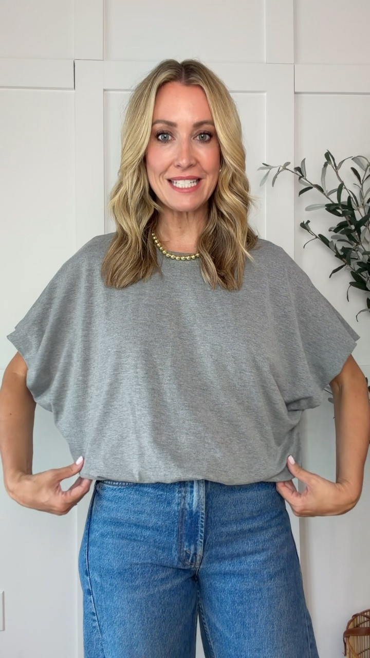 This bubble hem top is so cute! It looks great paired with jeans, track pants or ski skirts