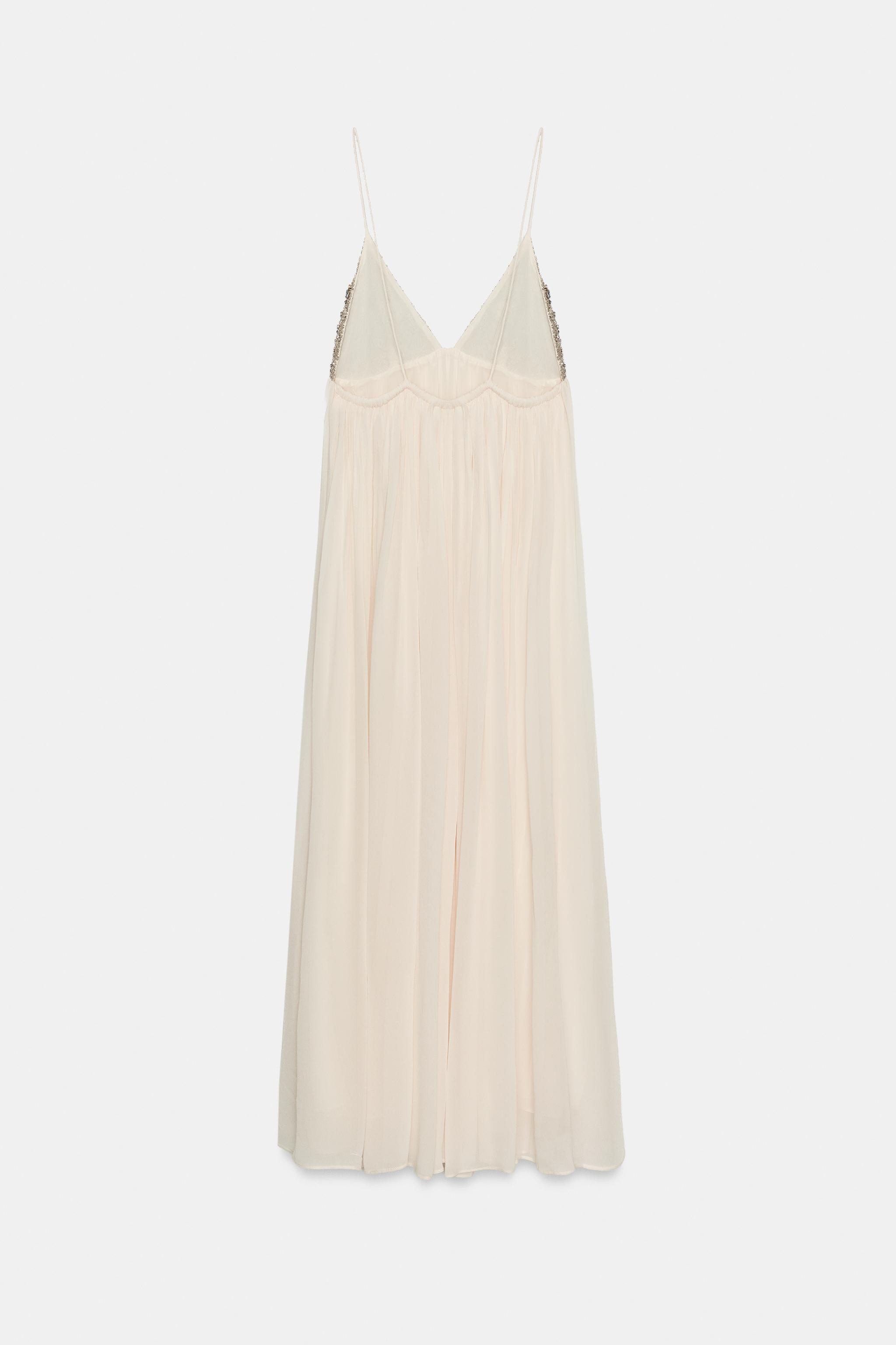 ZARA WOMAN COLLECTIONDress made with viscose yarn. V-neckline and shoulder straps. Contrast bead ... | Zara US