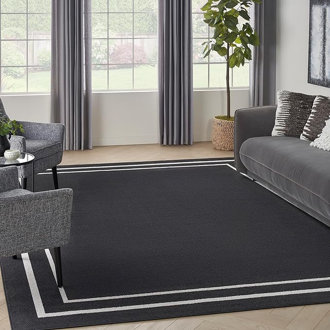 Nourison Essentials Solid Black Ivory 9' x 12' Area Rug, Easy Cleaning, Non Shedding, Bed Room, L... | Amazon (US)