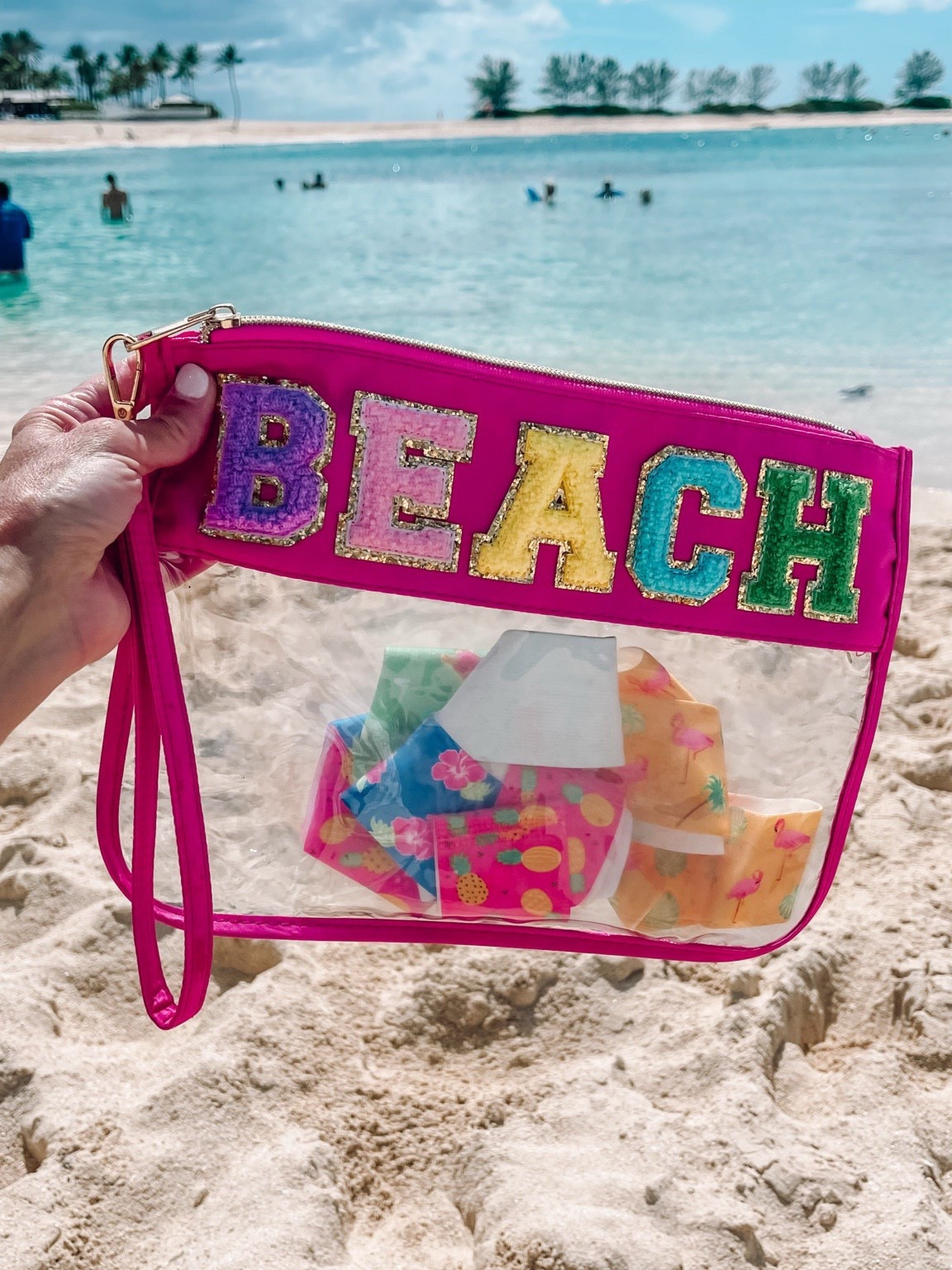 Beach bag perfect for small items / stored my phone in this bag to keep the sand off of it. Towel bands were perfect for saving our chairs at the pool. 



#LTKTravel #LTKSwim #LTKItBag
