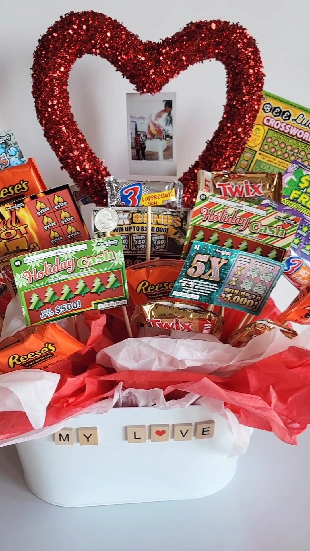 Valentine's day gift basket I made for my love 🤍🩷❤️ - so we don't really celebrate Valentine's day but I thought I would surprise him anyways 🤪 I made a lottery gift basket for him before, I wish I had a picture but sadly I don't.. Gift baskets are so fun & completely customizable, depending on who you're making one for! I used candy & lottery tickets BUT feel free to add snacks, alcohol, makeup, or whatever the person likes 😊 Could make this for a birthday, graduation, congratulations, or a just because (which is my personal favorite 🤪) I like to add personalized touches for example I used 9 lottery tickets since that's how many Valentine's days we've spent together & the quarter included is the year we started dating 💛 This Polaroid of us is not that clear but I forget about my Polaroid camera since I use my canon camera the most lol NOTE: I can't link through hobby lobby so I shared similar basket / wood tiles (since I got those there) Happy Loving Day friends extra grateful for you all 🥹

| Valentine's Day, Wedding Guest, Vacation Outfit, Jeans, Winter Outfits, Work Outfit, Resort Wear, Maternity, Cocktail Dress, Baby Shower, Coffee Table, Bedding, Bedroom, Living Room, Sneakers, Nursery, valentines gift, valentines basket, gifts for her, gifts for him, gifts for boyfriend, gifts for girlfriend, gifts for wife, gifts for husband, valentines day outfit, valentines day dress, Easter basket, Easter dress, Easter family outfits, Hearth and Hand, project 62, hearth and hand with magnolia, target home, brightroom, mainstays, Thyme and Table, great value, better homes & gardens, your zone, pillowfort, room essentials, opalhouse, threshold | #LTKxPrime #LTKxMadewell #LTKCon #LTKGiftGuide #LTKSeasonal #LTKHoliday #LTKVideo #LTKU #LTKover40 #LTKhome #LTKsalealert #LTKmidsize #LTKparties #LTKfindsunder50 #LTKfindsunder100 #LTKstyletip #LTKbeauty #LTKfitness #LTKplussize #LTKworkwear #LTKswim #LTKtravel #LTKshoecrush #LTKitbag #LTKbaby #LTKbump #LTKkids #LTKfamily #LTKmens #LTKwedding #LTKeurope #LTKbrasil #LTKaustralia #LTKAsia #LTKxAFeurope #LTKHalloween #LTKcurves #LTKfit #LTKRefresh #LTKunder50 #LTKunder100 #liketkit https://liketk.it/4wAhI @liketoknow.it