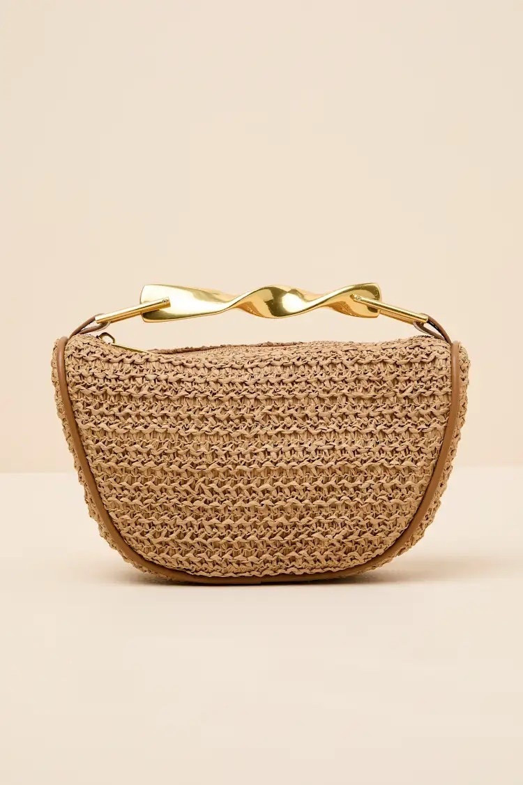 This beachy and chic handbag is the ideal summer companion, spacious enough for all your sunny day accessories yet effortlessly stylish. The woven raffia silhouette features a zipper top, a twisted top handle, and an internal sidewall pocket, offering a way to keep things organized. Attach the adjustable crossbody strap for a hands-free look. ON SALE and under $40.

Keywords: Beach bag, woven tote bag, crossbody bag, spring outfit accessories, spring outfit handbags, straw bag, mini tote bag, faux leather bag, beach vacation bag, spring break, spring break outfits, resort outfits women, beach bag, beach handbag, day date, date night outfits, summer vacation, summer handbags, day date, date night outfits, festival outfits, festival handbags 



#LTKFestival #LTKSaleAlert #LTKTravel