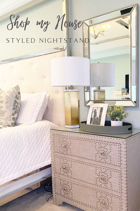 Styled nightstand 
Bedside lamp
#homedecor #decorating #fauxplants peonies framed Paris print faux plant pink #chinoserie lamp gold lamp 
Tray target shagreen tray 
Framed picture decorative coffee table books blue and white lamp ginger temple jar stack of books 

#LTKhome #LTKsalealert #LTKstyletip