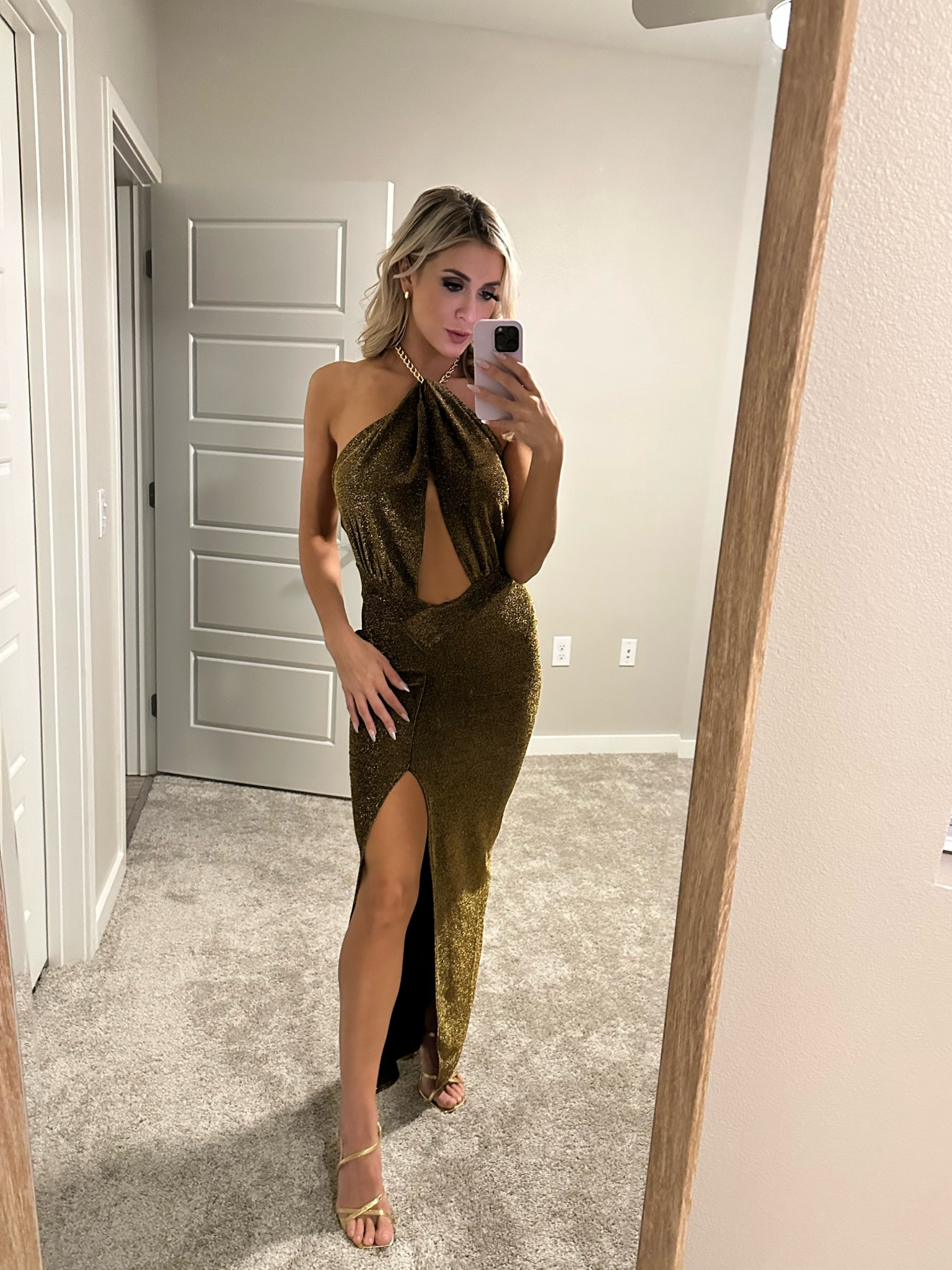 Vegas formal outfit! Long halter gold dress with slit.

#LTKSeasonal #LTKwedding #LTKFind