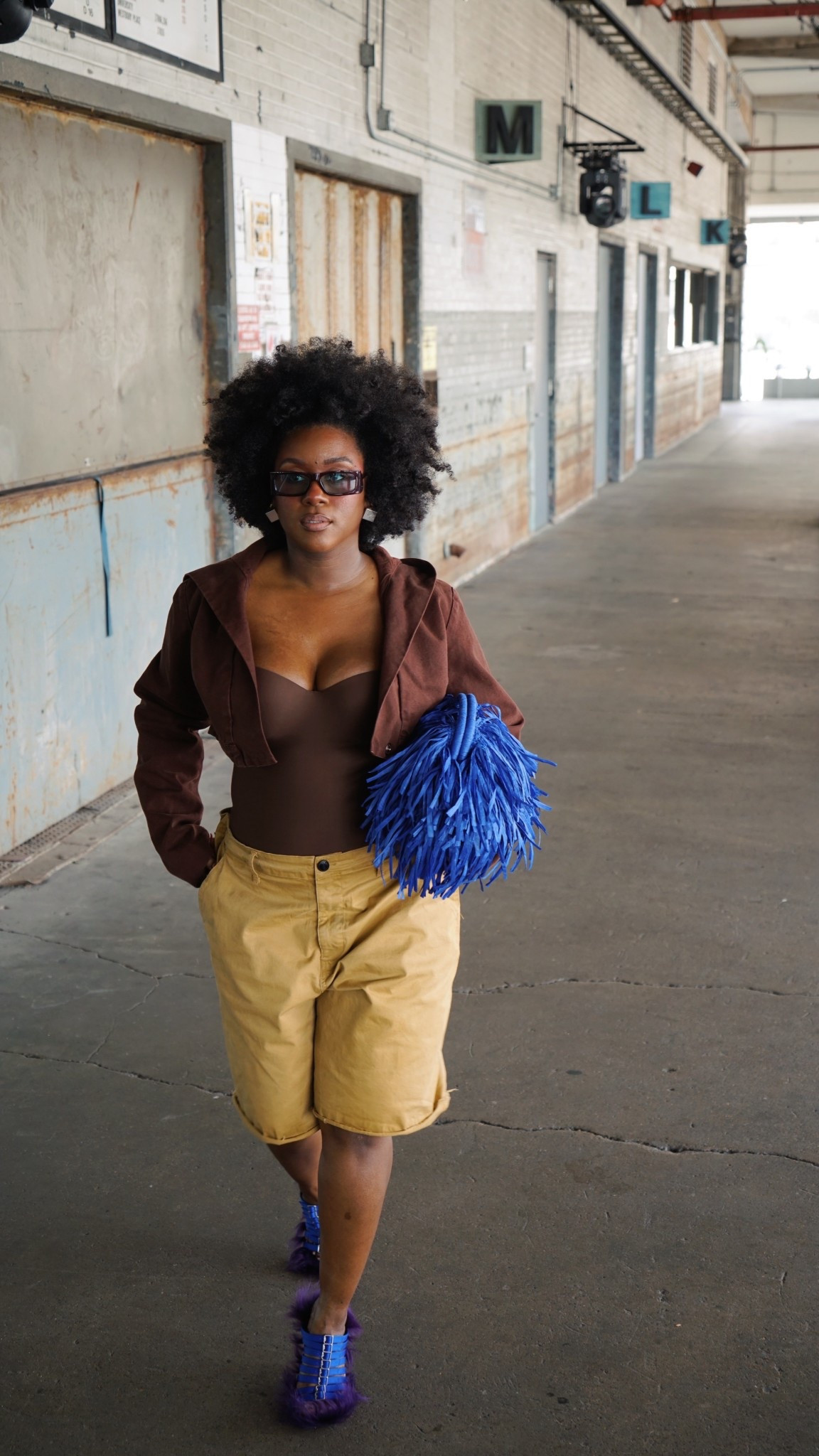 Tan jorts, brown bodysuit and raffia bag that comes in all colors and sizes. This is a medium 