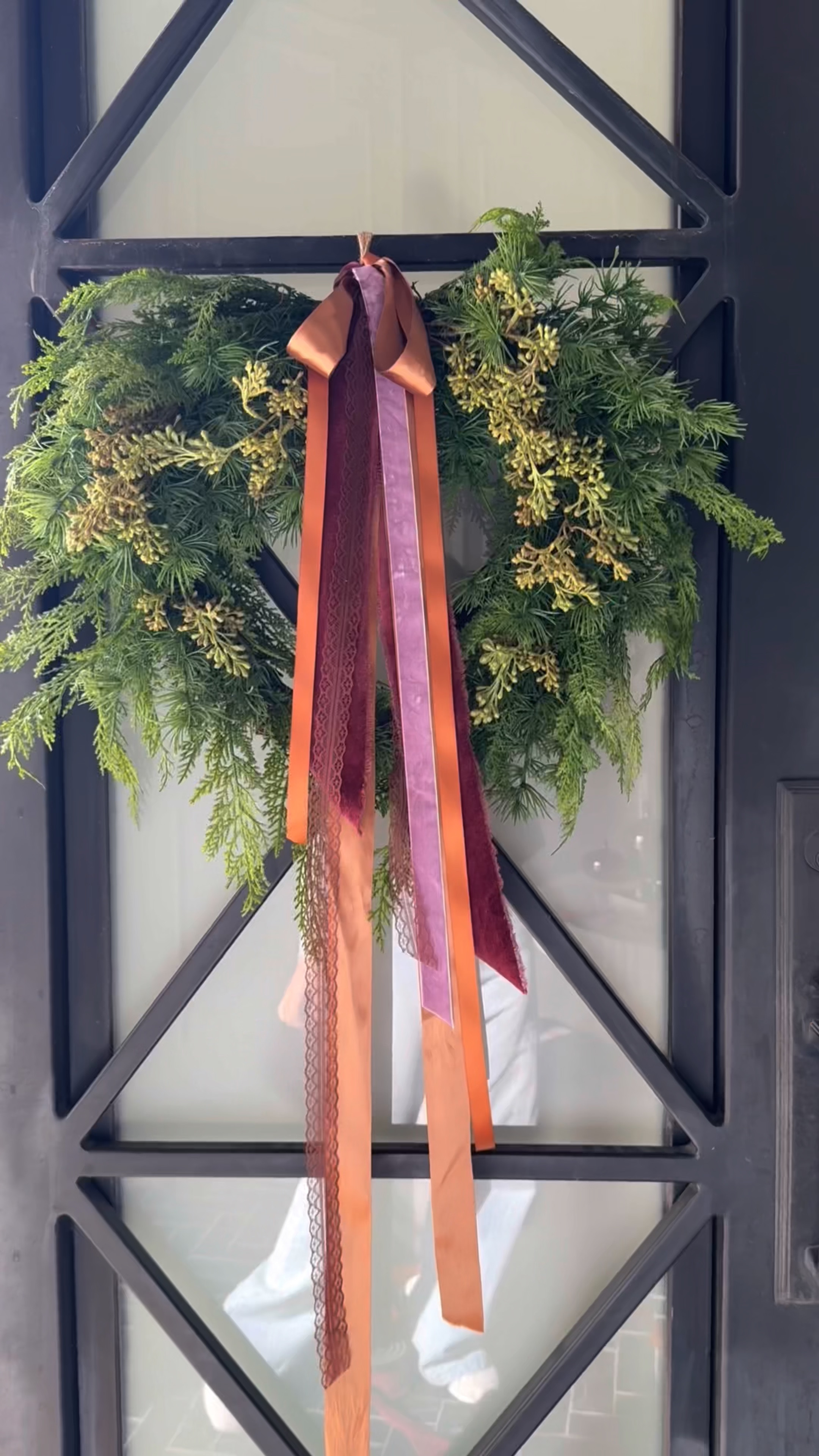 Love these mixed faux green wreaths! They look so realistic and they are a substantial size! Wreaths are On sale currently with free shipping.

Add layers of ribbon in different colors, sheens, and textures to create a super elegant look. This is a great way to use your holiday green garland and wreaths to create a crossover look for Thanksgiving and Christmas. 

#LTKStyleTip #LTKSaleAlert #LTKSeasonal