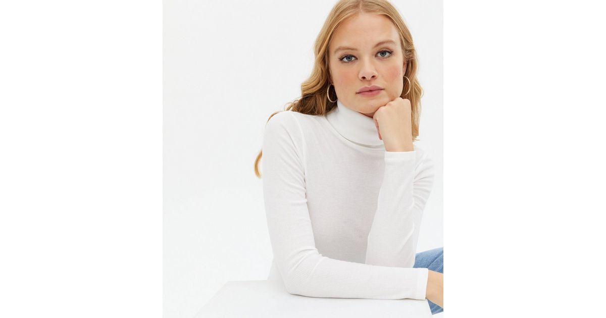 White Ribbed Long Sleeve Roll Neck Top
						
						Add to Saved Items
						Remove from Saved It... | New Look (UK)