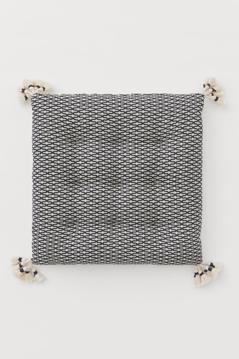 Seat cushion in woven cotton fabric with pattern-weave fabric at front and braided tassels at eac... | H&M (US + CA)