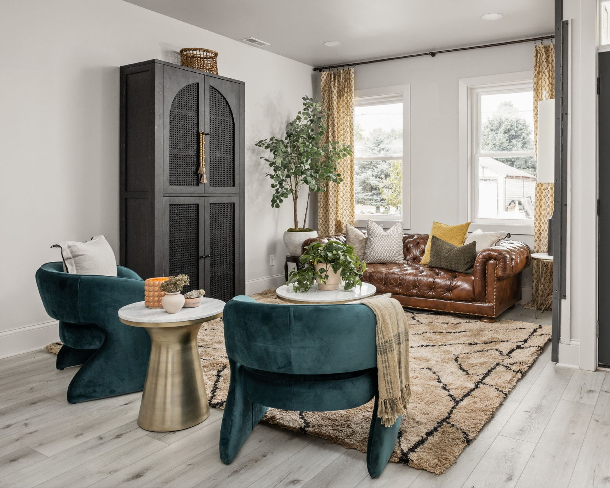 Lots of plants and pops of color crest an urban jungle vibe.

#LTKhome