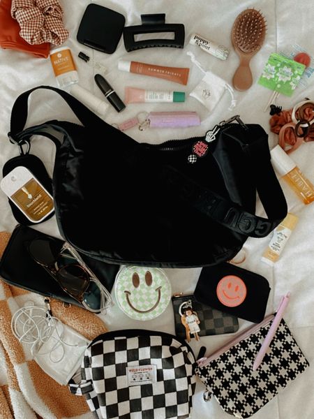 everything I keep in my medium crescent Baggu 🖤 

#LTKbeauty #LTKitbag