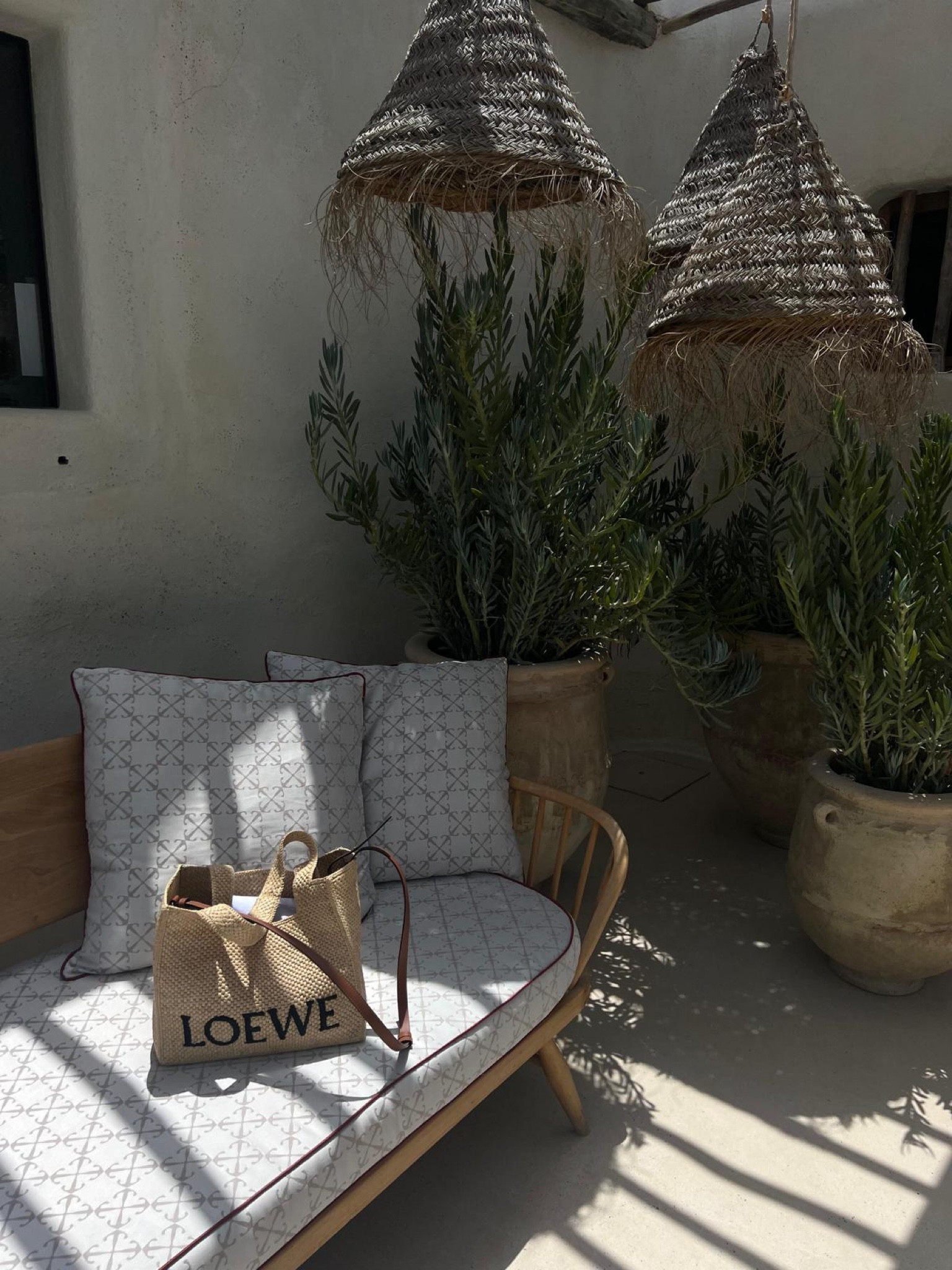 
LOEWE basket bag in its happy place - Casa Jondal, Ibiza ☀️

Wicker lampshades, mid-century modern furniture, tile print cushions, Sun lounger, daybed, chaise longe, interior design, exterior design, beach style interiors, summer style, laid back, basket bag, rattan bag, raffia bag, beach bag, effortless chic. 

#LTKeurope #LTKitbag #LTKtravel