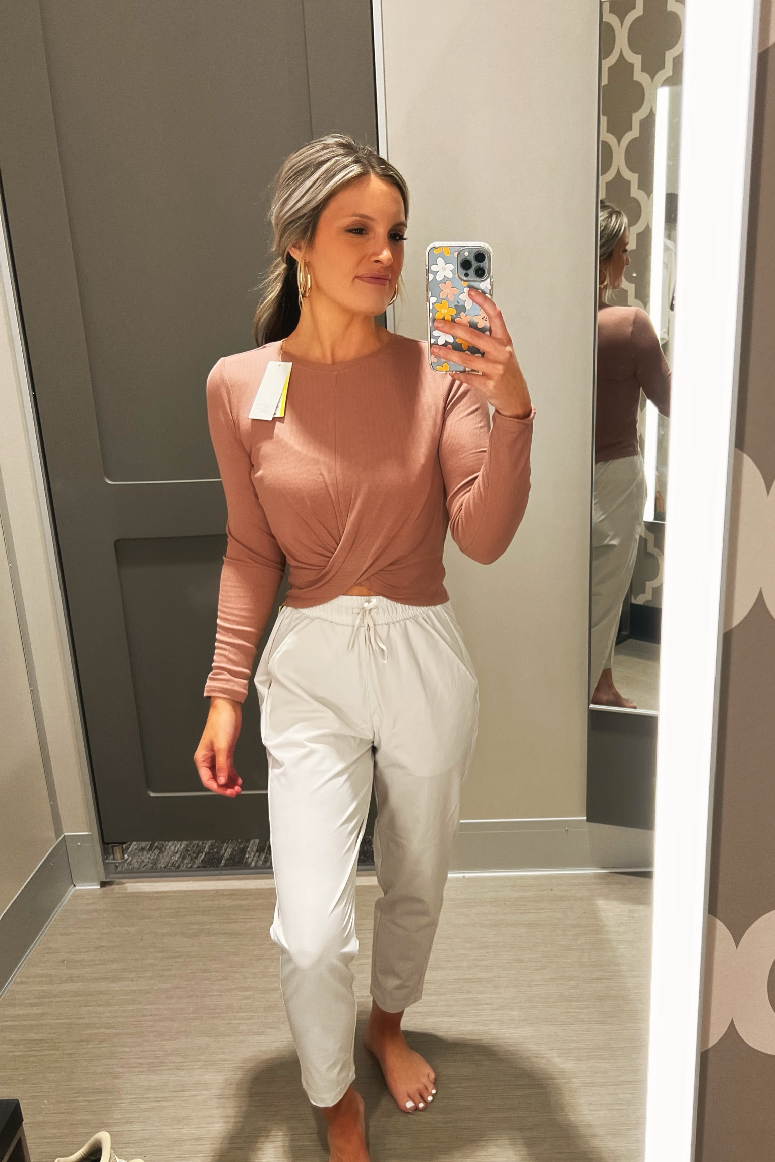 Love these joggers! Wearing a size xs and I’m 5’4. Material is moisture wicking fabric but comfortable! Perfect for in between seasons. 
Twist top I’m wearing a size small, long sleeve isn’t available online yet so tagging the tank! 

#LTKFind #LTKSeasonal #LTKunder100