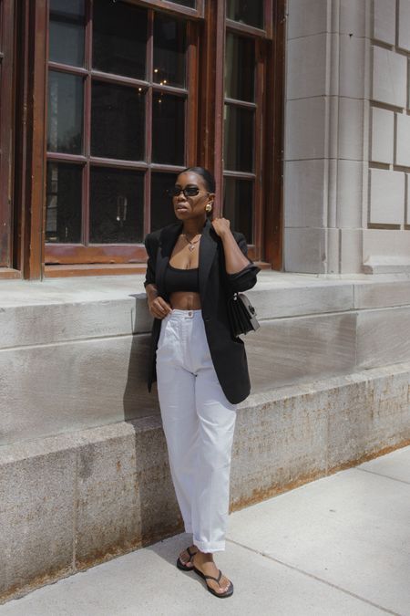 Oversized blazer with bra top and white pants. Minimalist outfit. Casual outfit. Black and white outfit 

#LTKFindsUnder100 #LTKStyleTip