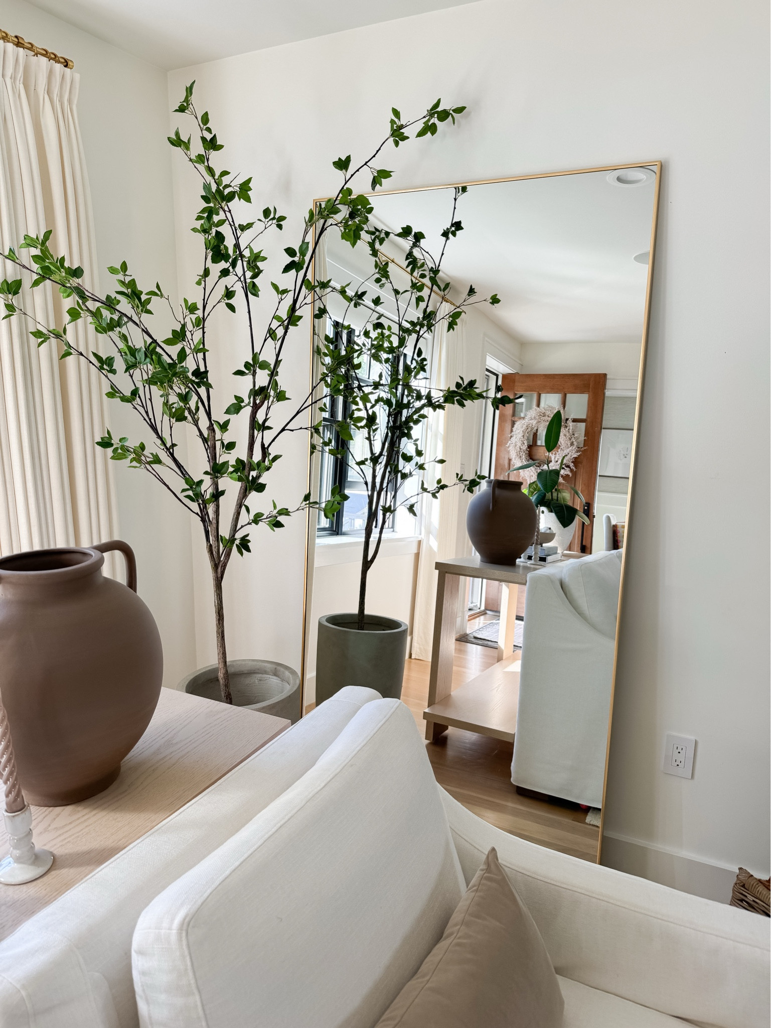 This mirror makes all the difference in this corner! 

Neutral home aesthetic, full length mirror, faux tree, ceramic vase, living room decor 

#LTKHome #LTKStyleTip #LTKU