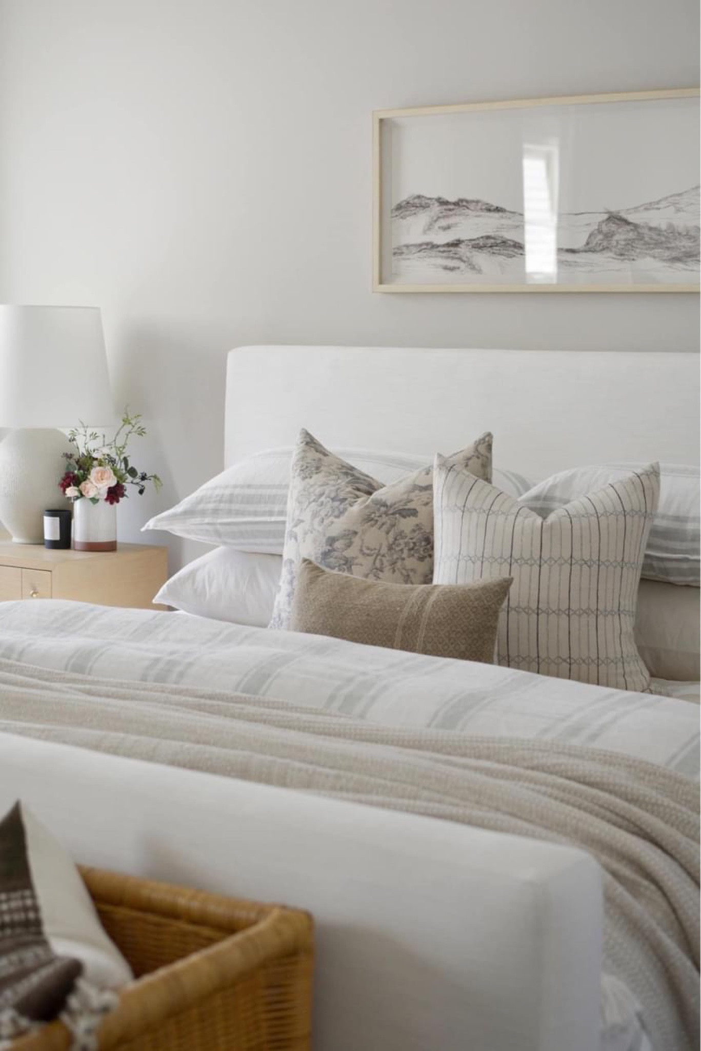 Primary bedroom suit- white upholstered bed, vintage pillows, striped duvet cover, studio McGee, McGee and co 

#LTKunder50 #LTKhome #LTKFind