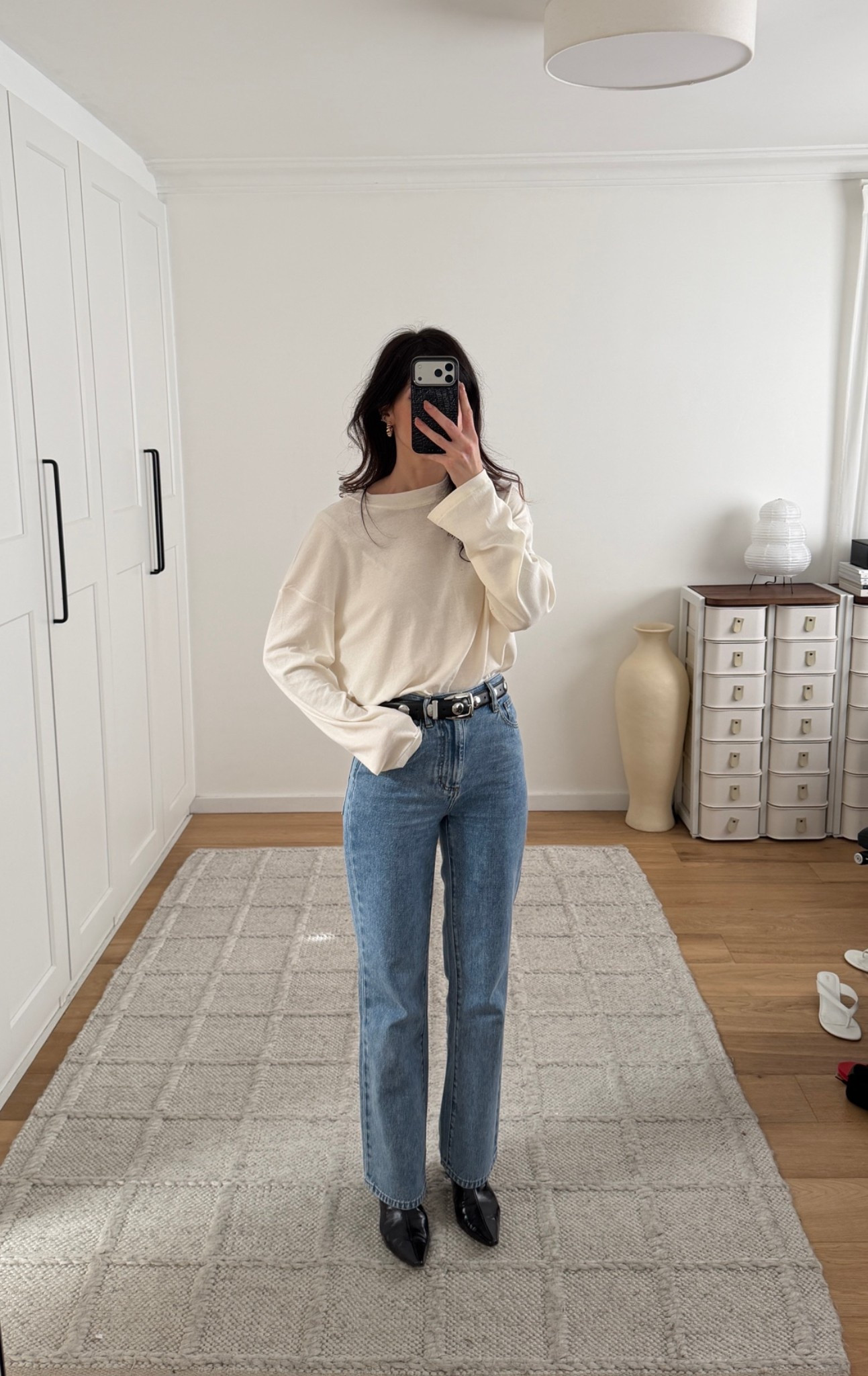 Wearing top in size S, and jeans in size AU6