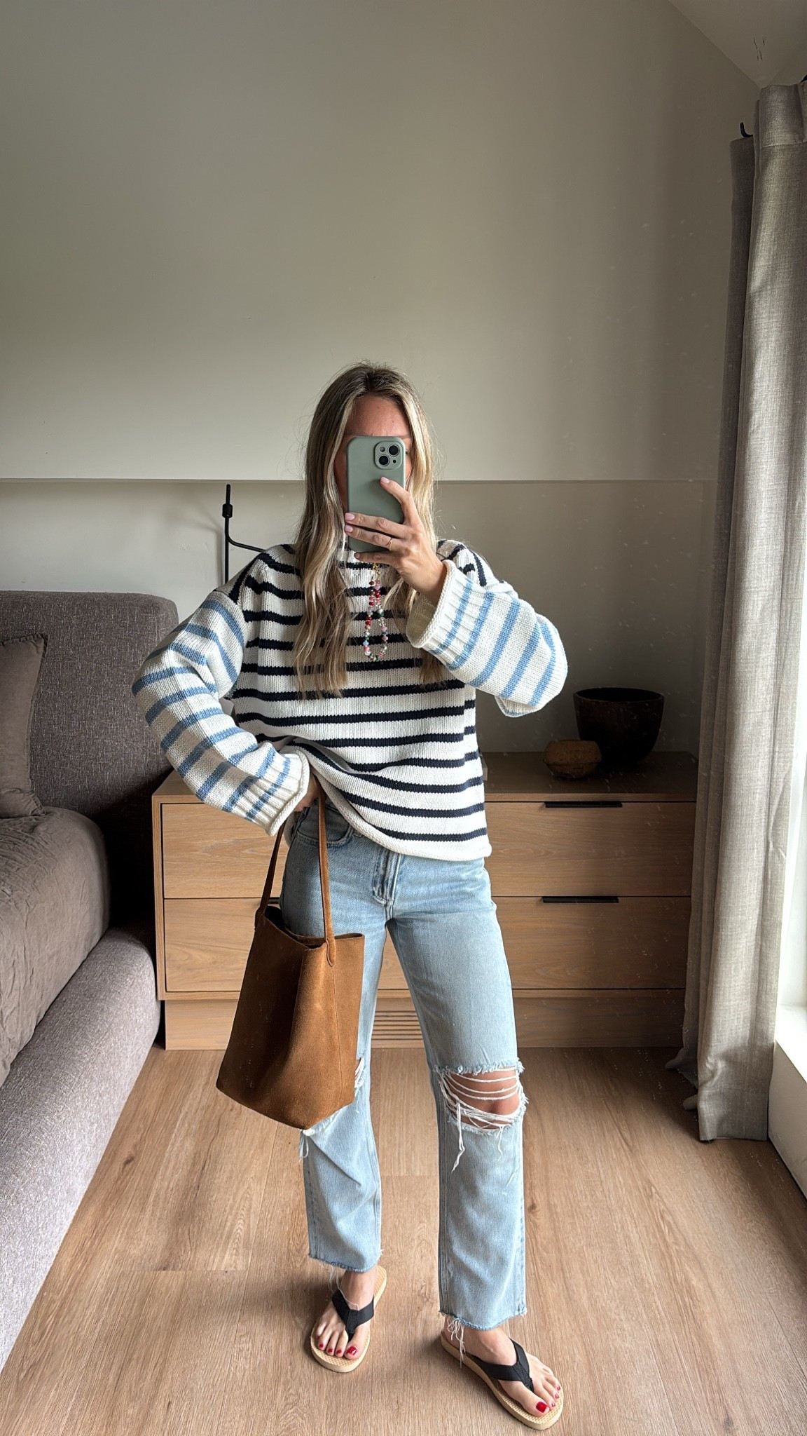I have this sweater and three colors. It is the best and true to size. Amazon bag is a must and really affordable! Flip-flops are my everyday shoe and size up 1! Jeans are old page denim can’t find a link ￼

#LTKdayinmylife #LTKgrwm #LTKootd