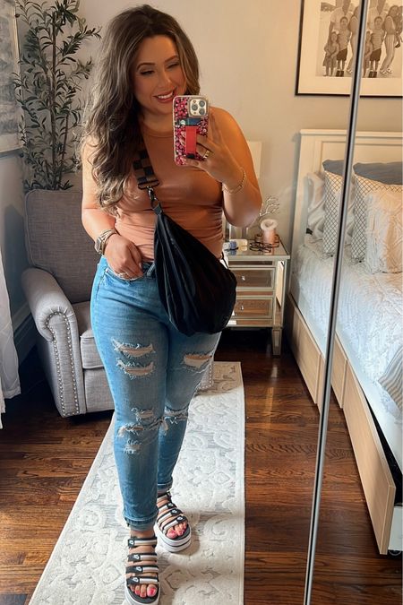 Easy Mommy Fit size down in these jeans! I’m normally a size 10 and a size 5 in Judy blue jeans! The cami is so soft and I love this diaper bag from citimouse. The Apple Watch band is one of my favs too! 

#LTKstyletip #LTKFind #LTKunder50