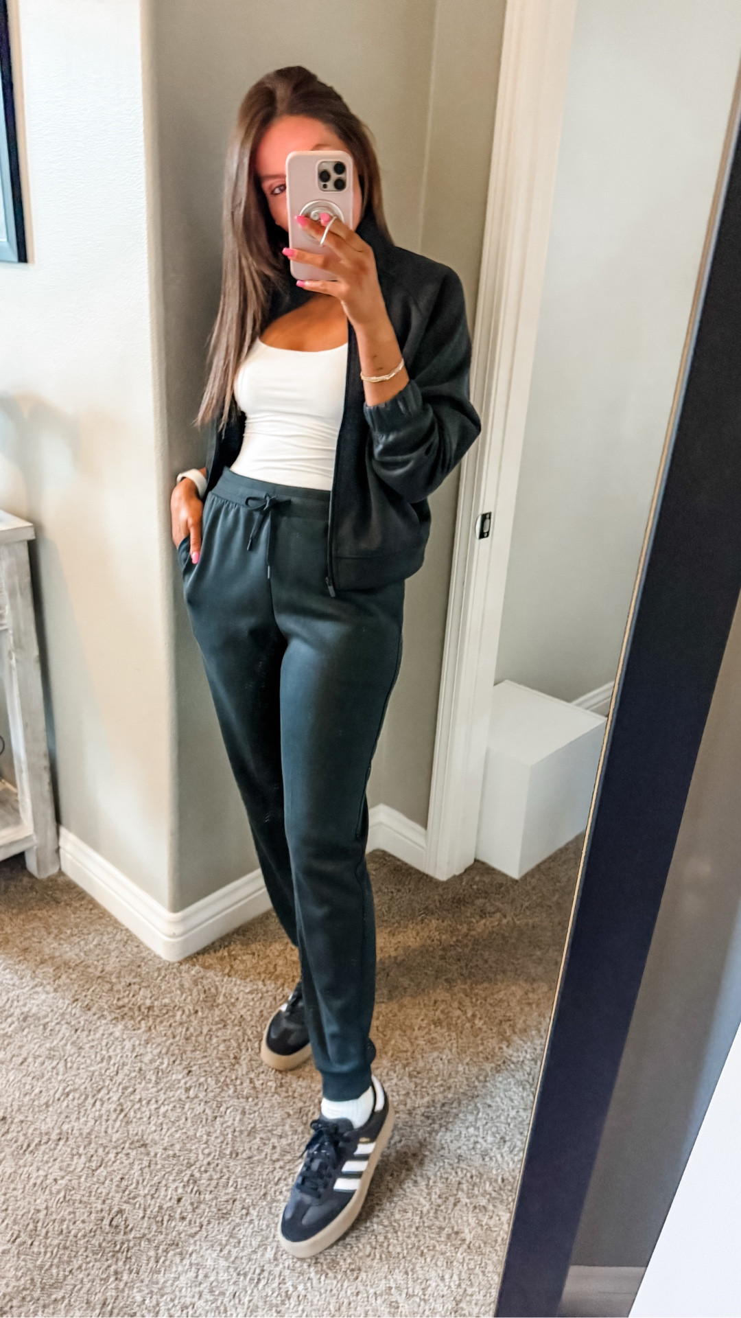 Size S jacket & joggers. I’m 5’7 for reference on the length. Joggers hit me right at my ankles. Size M tank 

#LTKTravel #LTKgrwm #LTKootd