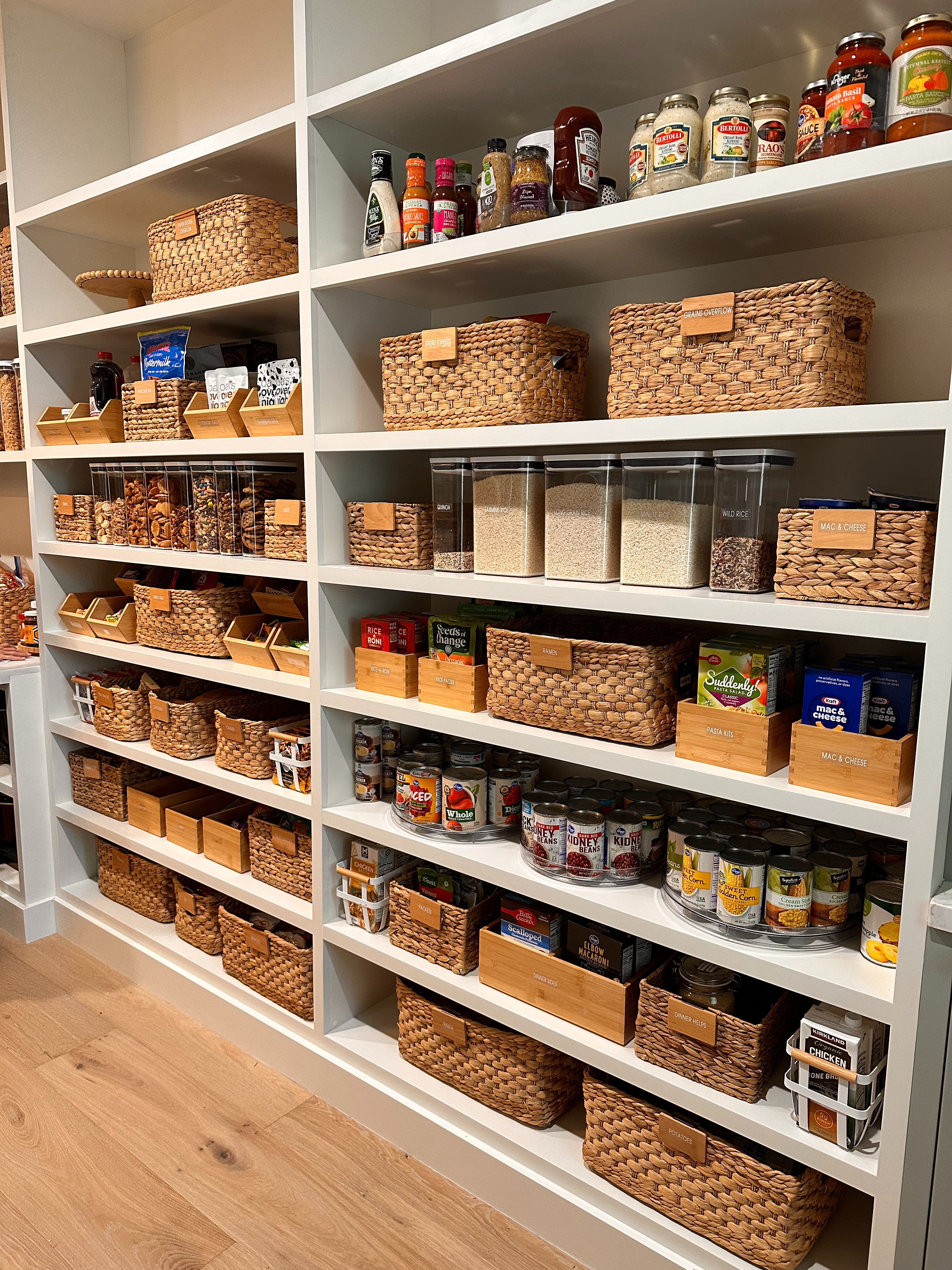 Mixing wicker, wood, and metal adds beautiful texture and interest in a pantry, just like we did here.

But most importantly, every product serves a purpose.
It creates a home for your food so everything is labeled, easy to find, and looks stunning.

So beautiful and functional.

#organizesimply #pantryorganization #kitchenorganization #thetracyway 

 #LTKHome #LTKFamily