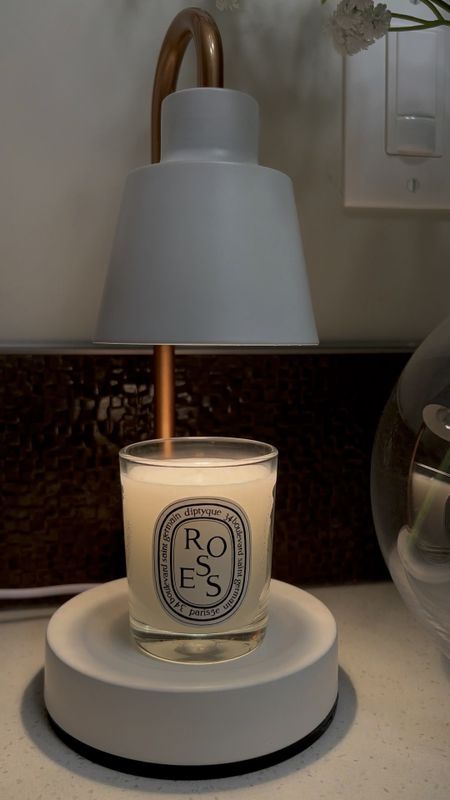For all my fellow candle forgetters out there, I've got a game-changer for you! 😅 These little gems warm up the wax faster than a flame and keep that amazing fragrance going strong. But here's the best part – they pull double duty as a cozy little lamp, perfect for small spaces like my countertop. I can't get enough of these – they're all over my home! 🥰 Get ready to simplify and elevate your ambiance.
#lighting #candle #homedecor #musthaves 

#LTKhome #LTKsalealert #LTKstyletip