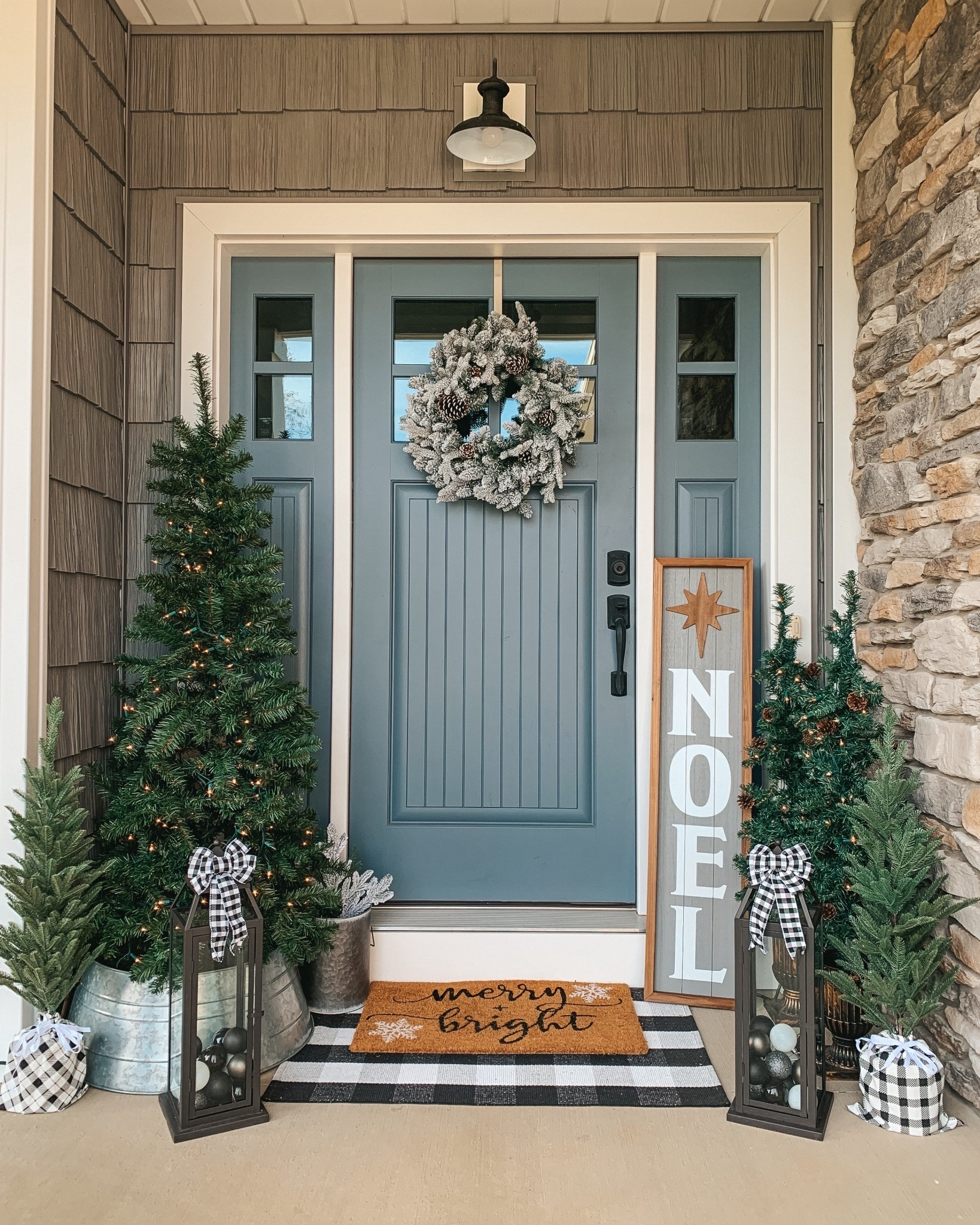 Christmas front porch decor. Christmas porch. Christmas decor. Holiday porch. Holiday home decor. Modern farmhouse front porch. Front door. 

#LTKHome #LTKHoliday