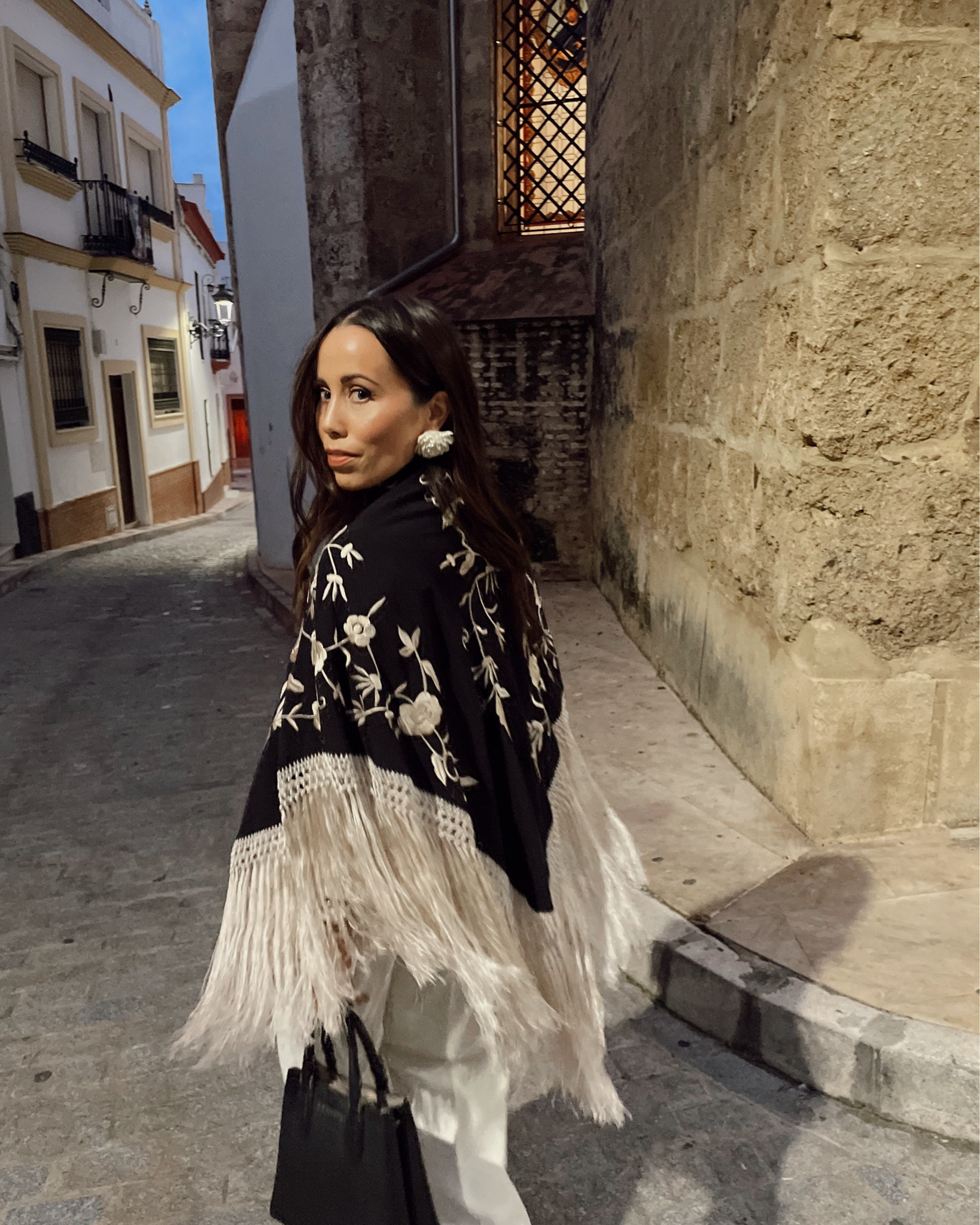 Realized I never posted these photos from our trip to Seville (Sevilla) in November. This Mantón de Manila was a very precious wedding gift and am so excited to have in my wardrobe as a globetrotter and lover of all things cultural fashions. Linking similars and these must-have wide leg trousers. 🖤

#LTKTravel #LTKStyleTip
