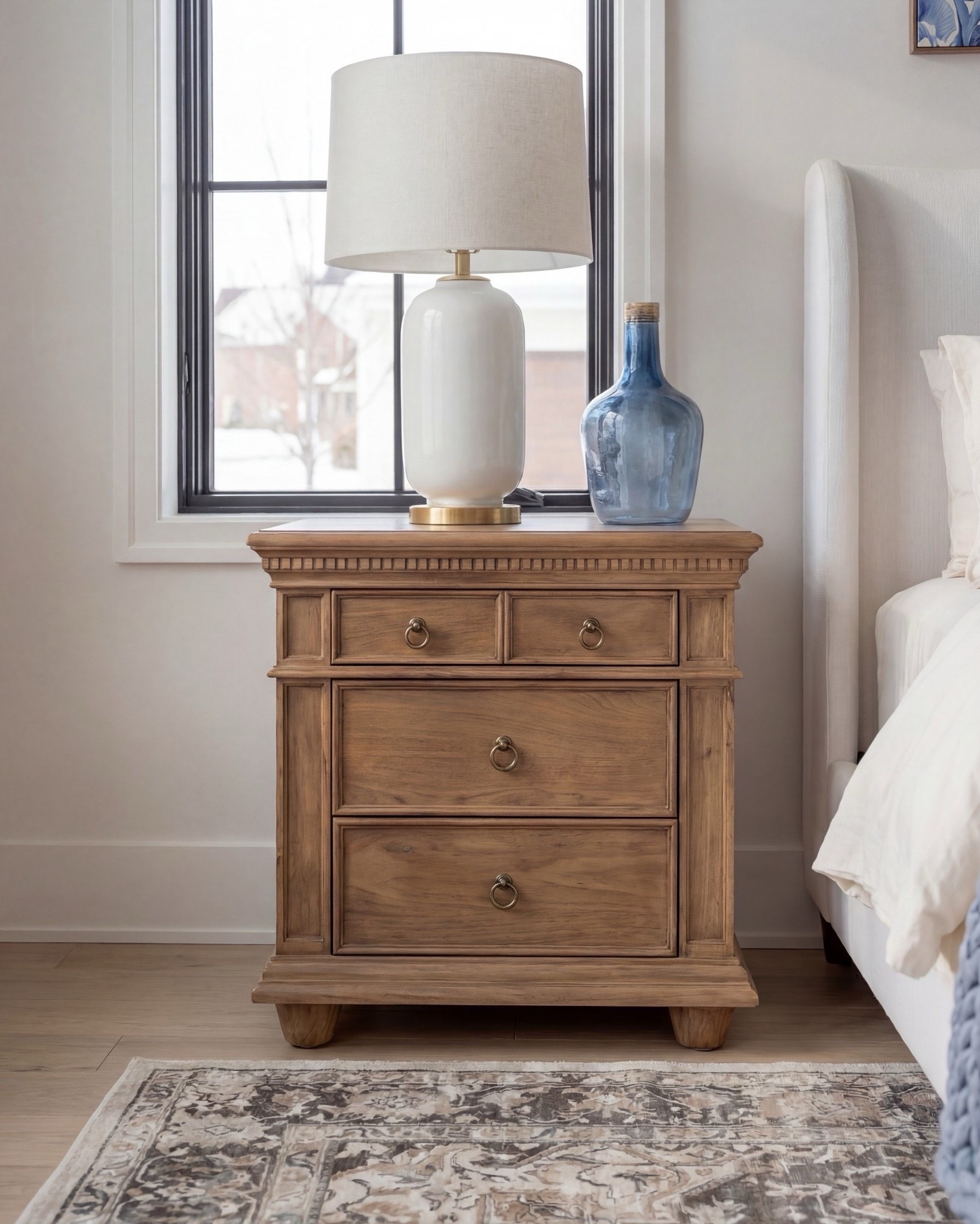 Shop the Look: Bedroom Refresh
This bedroom is soft, serene, and timeless. The pale botanical ceiling wallpaper paired with exposed wood beams creates a subtle statement that feels warm and elevated without overpowering the space.

The upholstered bed anchors the room, layered with crisp white bedding and a chunky blue knit throw for texture. Blue-and-ivory artwork ties seamlessly into the pillows and accents, keeping the palette calm and cohesive.

Shop the Look:
• Upholstered bed frame (soft ivory fabric)
• White bedding set (cotton or linen)
• Chunky knit throw blanket (dusty blue)
• Blue and ivory accent pillows
• Wood nightstands (warm oak tone)
• Ceramic table lamps (white with brass detail)
• Blue glass decorative bottles
• Framed blue botanical wall art (set of three)
• Upholstered bench with fluted wood base
• Vintage-style area rug (beige, taupe, muted blue)
•White decor books
•Wood Decor beads 

#LTKSpringSale #LTKSaleAlert

#LTKsale #LTKhome