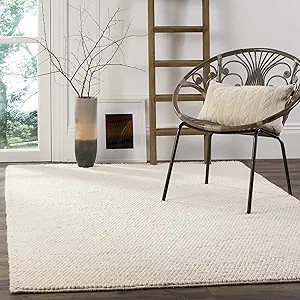 SAFAVIEH Natura Collection Area Rug - 6' x 9', Ivory, Handmade Wool, Ideal for High Traffic Areas... | Amazon (US)
