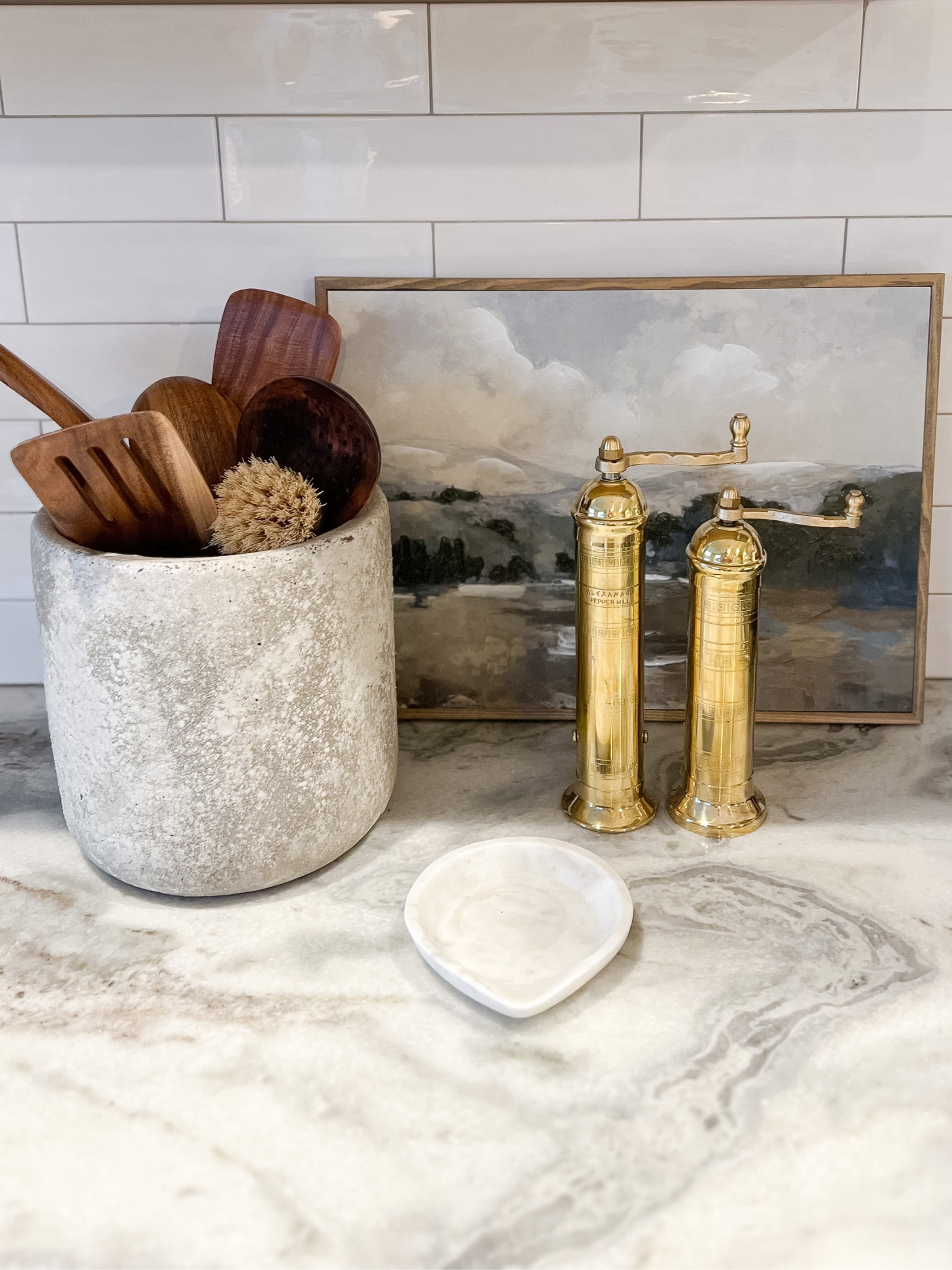 Easy countertop styling 

White kitchen, marble kitchen, brass salt and pepper shakers, utensil crock 

#LTKhome