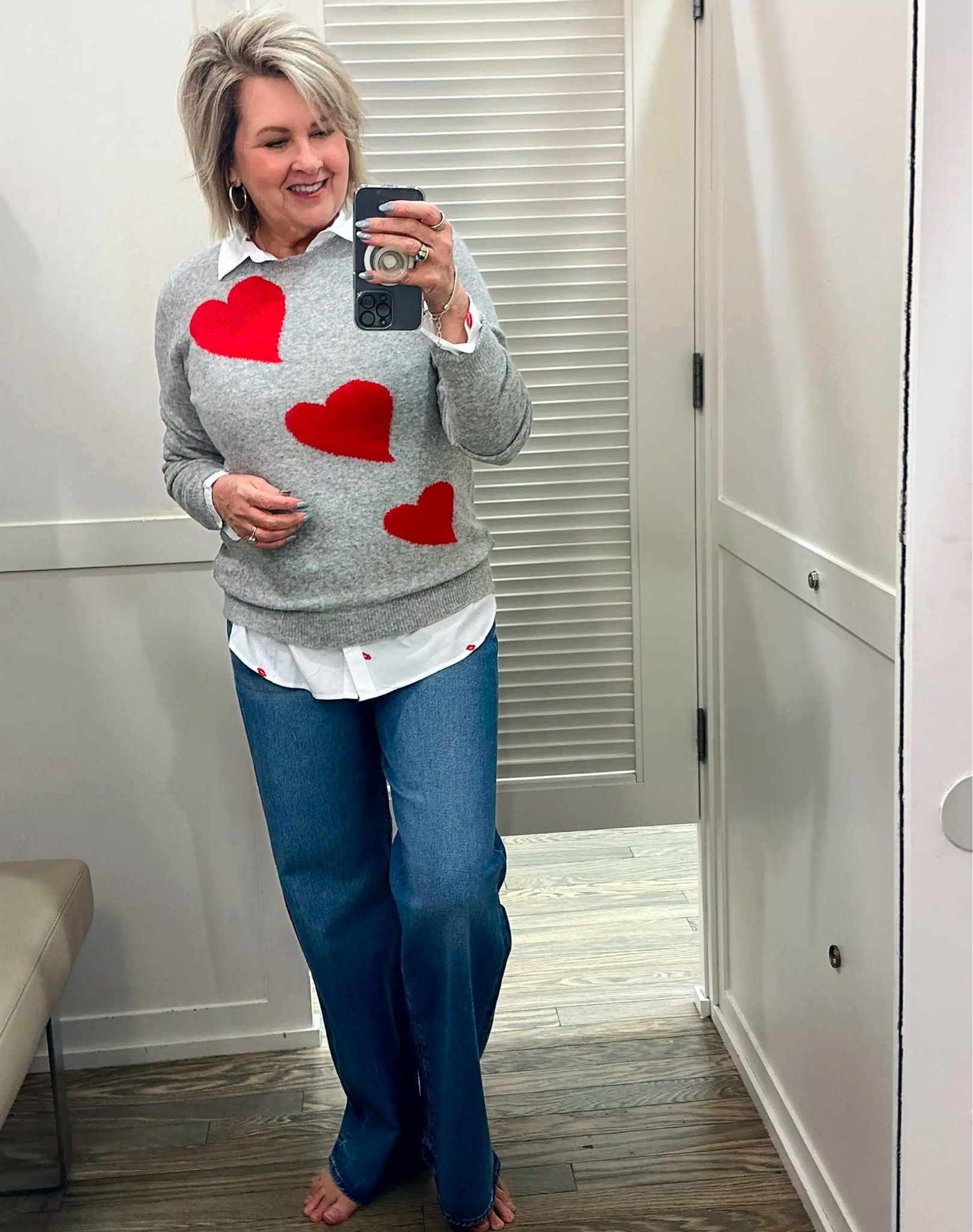 Another great outfit idea for Valentine’s Day! I’ve paired the white shirt with lips under this gray heart sweater for a dressier look and went casual with denim jeans. The sweater and shirt are size medium and jeans are an 8.

#LTKSeasonal #LTKWorkwear #LTKStyleTip