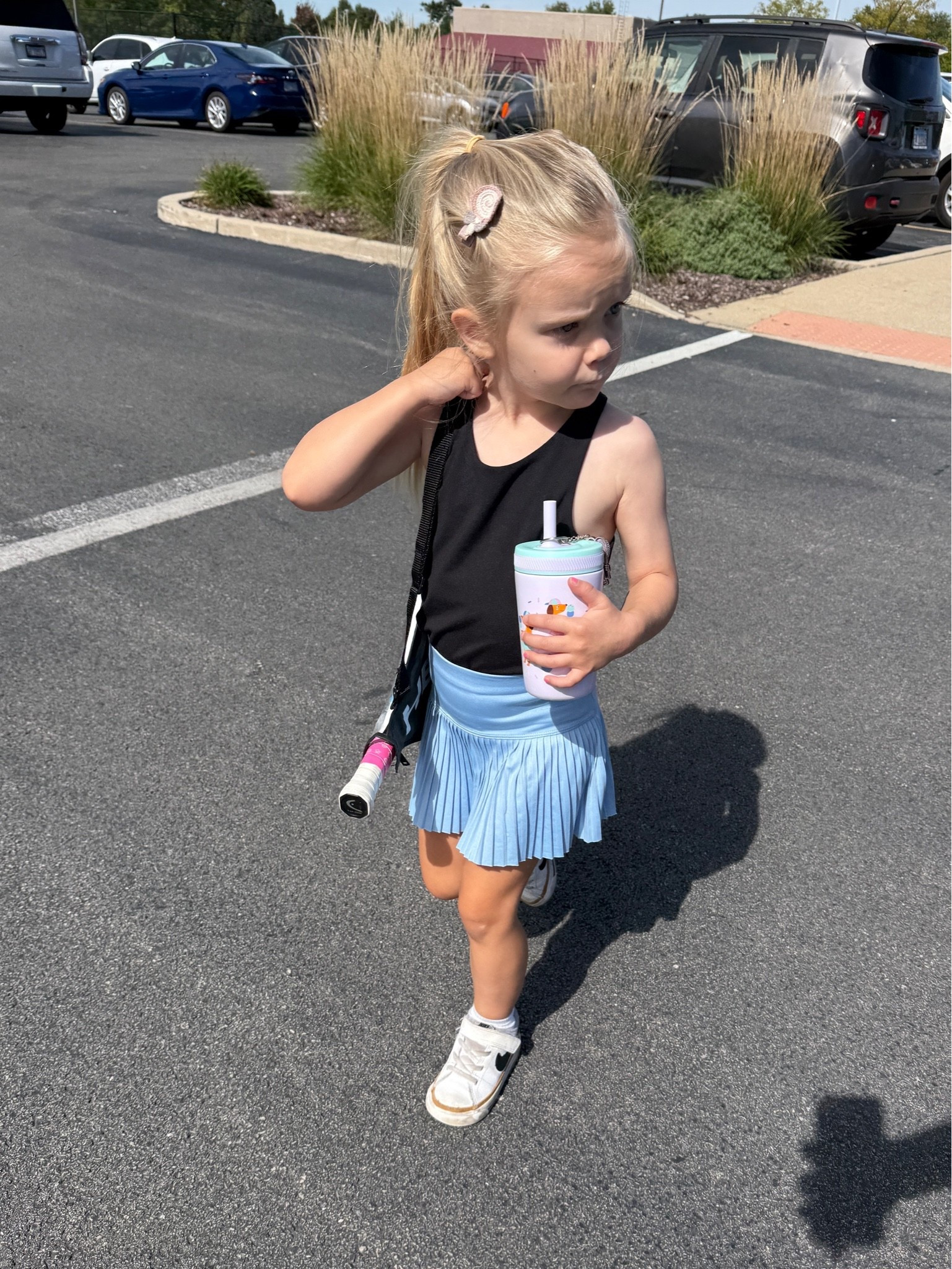 My tiny little tennis pro heading into her fall session looking like a ringer. 🥰 Love this micro pleated skort! She looked adorable on and off the court, and even with her favorite tee on afterwards.

#LTKActive #LTKKids #LTKfitnessgoals