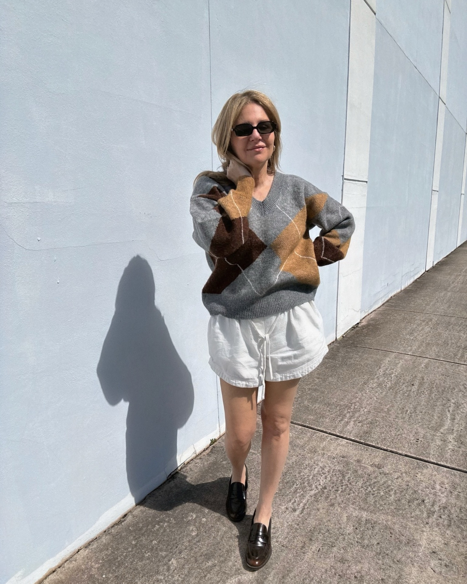 Kinda an “it’s hot outside but I’m cold inside” preppy outfit :) Wearing a lightweight oversized neutral colored v neck sweater w white drawstring shorts + brown penny loafers.

#LTKootd #LTKgrwm #LTKSeasonal