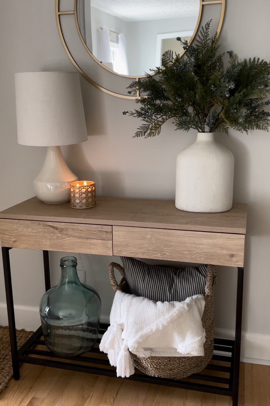 Simple and casual entryway 🤍 linked as much as I could and if not still available, I linked similar. The console table is no longer made but the  desk version of it is still!

Basket & throw-tj maxx 

#LTKhome #LTKfindsunder100 #LTKSeasonal