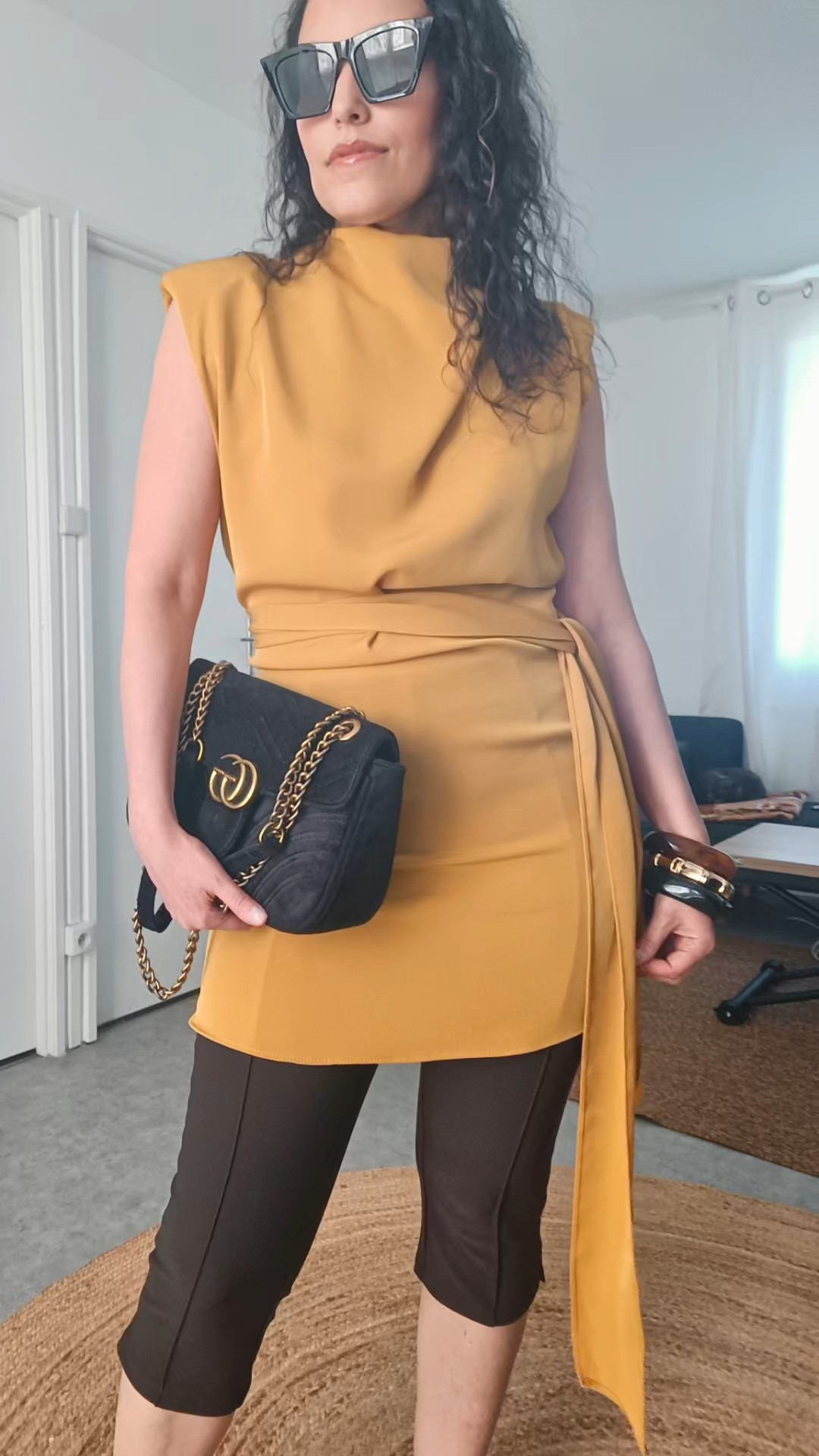 Summer trend alert ☀️🖤The capri pants are officially back and this is exactly how to wear them in 2026.A cinched waist tunic, sleek black capris, strappy kitten heel sandals, oversized black sunnies, stacked bangles, and a chic black shoulder bag = the effortless elevated summer outfit you’ll keep repeating.This look is the perfect mix of polished, minimal, and feminine — easy to wear, flattering on the waist, and ideal for warm days when you want to look put together without trying too hard. The capri silhouette is one of this summer’s biggest fashion trends and honestly… she’s having her moment ✨Save this look if you love:summer outfit ideas, chic minimal style, capri pants outfits, effortless classy looks, elevated basics, feminine summer fashion, neutral outfit inspo, European summer style#LTKStyle #LTKSeasonal #LTKFinds #SummerOutfit #CapriPants #CapsuleWardrobe #MinimalStyle #ChicStyle #ElegantOutfits #SummerFashion #NeutralStyle #EffortlessStyle #EuropeanSummer #FashionTrend #ClassyStyle

#LTKfrance #LTKeurope #LTKhome