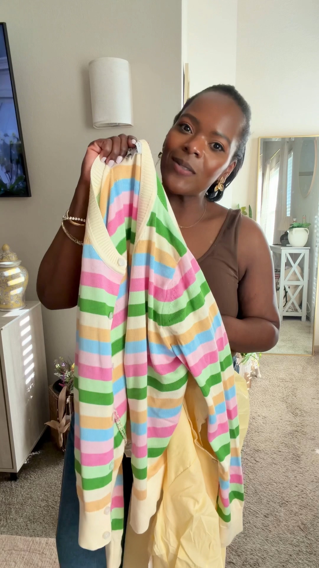 How cute is this bright stripe color cardigan from Walmart for $20?! I ordered a large but they sent a small and now I may just keep the small! 🤣🤣🤣

#LTKvlog #LTKgrwm #LTKdayinmylife