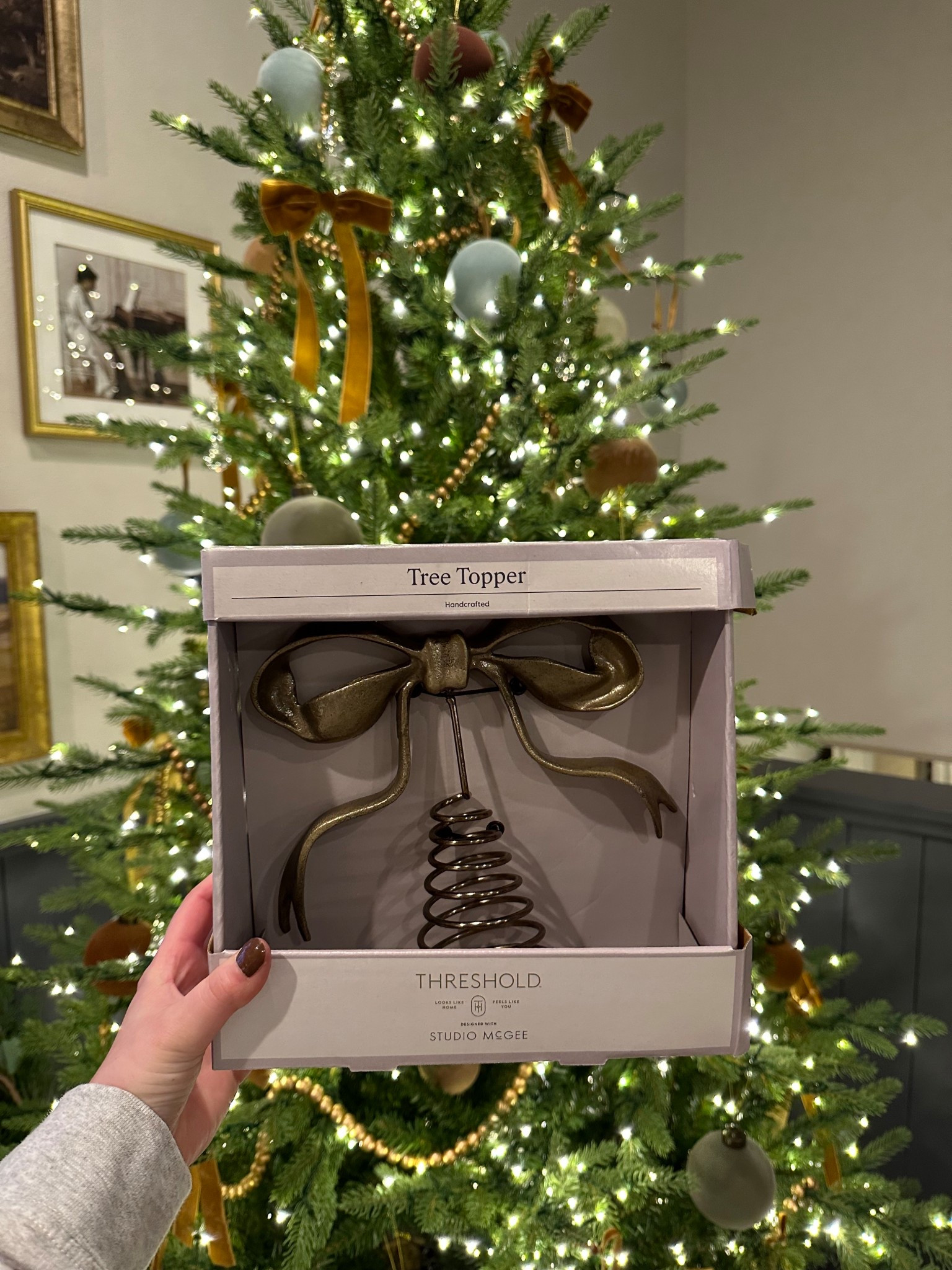 This brass bow Christmas tree topper is stunning!!!!

#LTKStyleTip #LTKHoliday #LTKHome