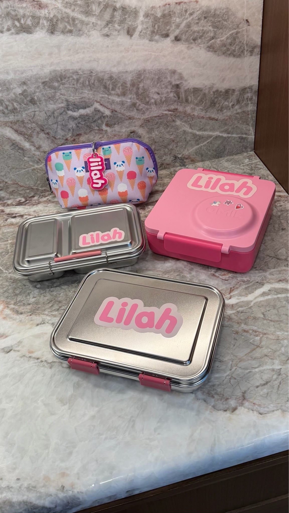 getting ready for the first day of school. here are the lunch boxes we’ll have on rotation this year, freezable snack bag, custom name tag and stickers